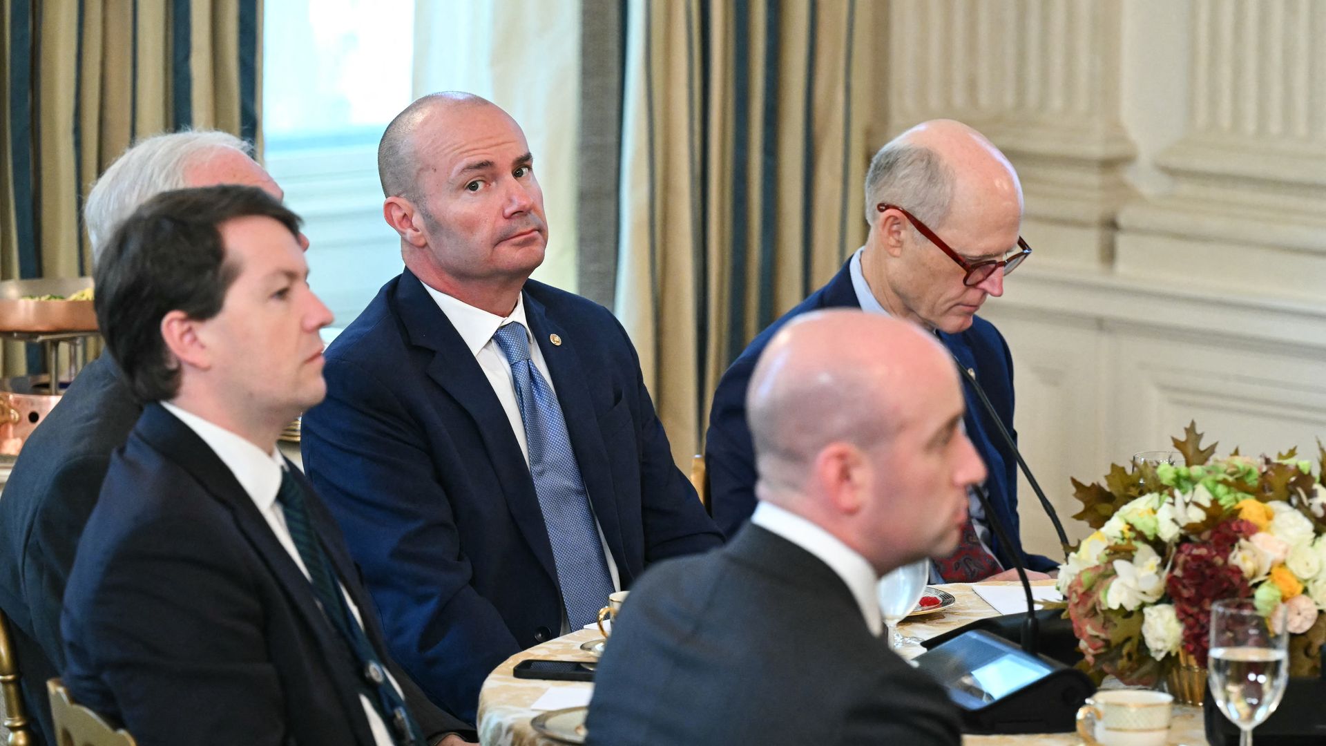 US Senator Mike Lee (C), Republican from Utah, listens as US President Donald Trump speaks during a breakfast meeting with Senate Republicans in the State Dining Room of the White House on November 5, 2025, in Washington, DC. (Photo by SAUL LOEB / AFP) (Photo by SAUL LOEB/AFP via Getty Images)