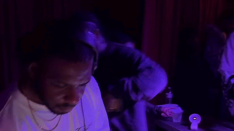 a video of a dj that then pans over to a crowd