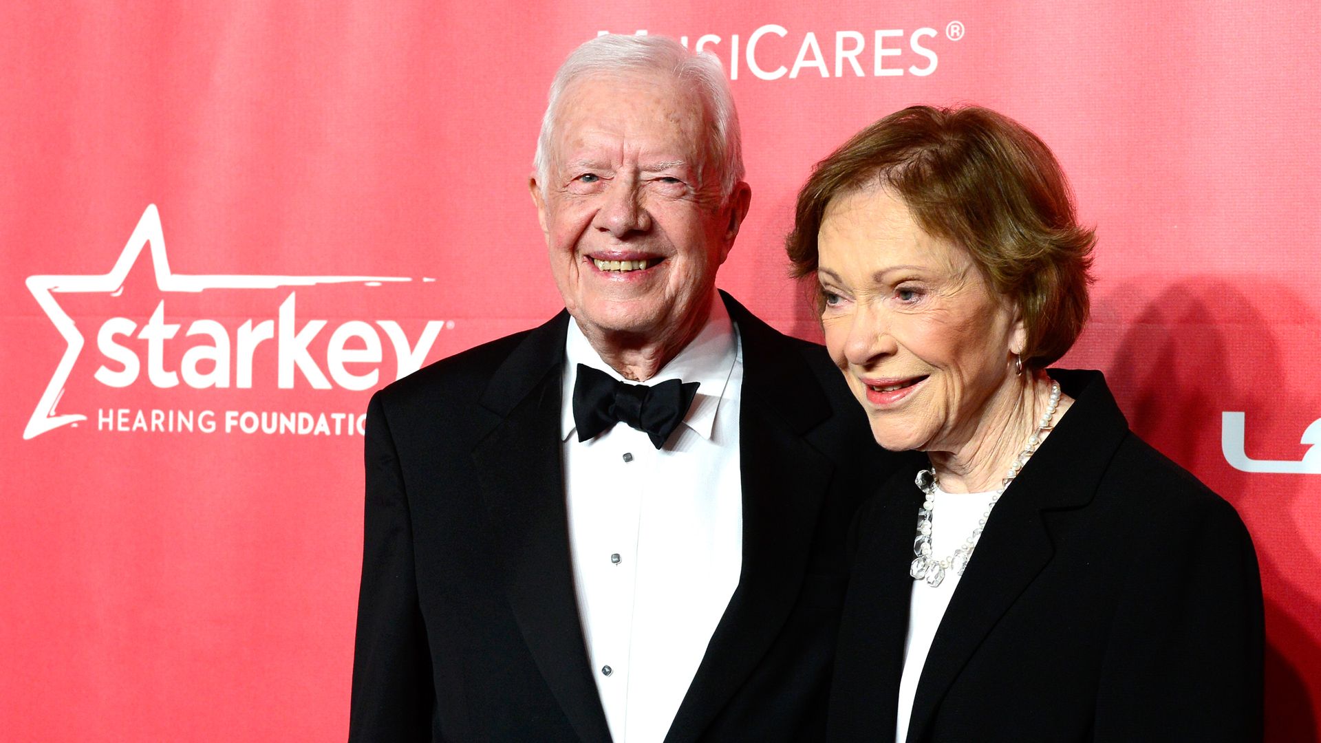 President Jimmy Carter (L) and former First Lady Rosalynn Carter attend the 25th anniversary MusiCares 2015