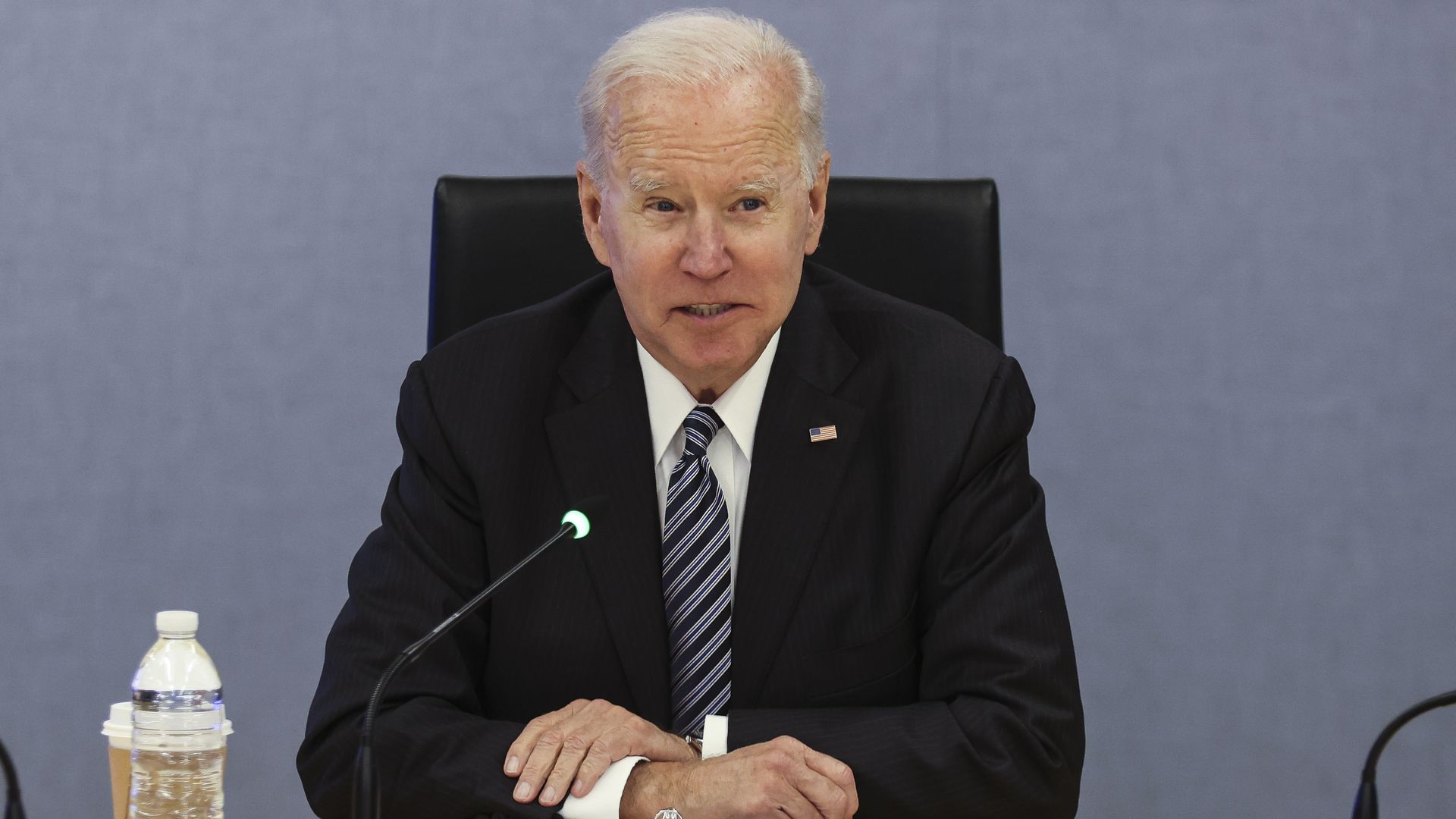 Biden sits in a chair