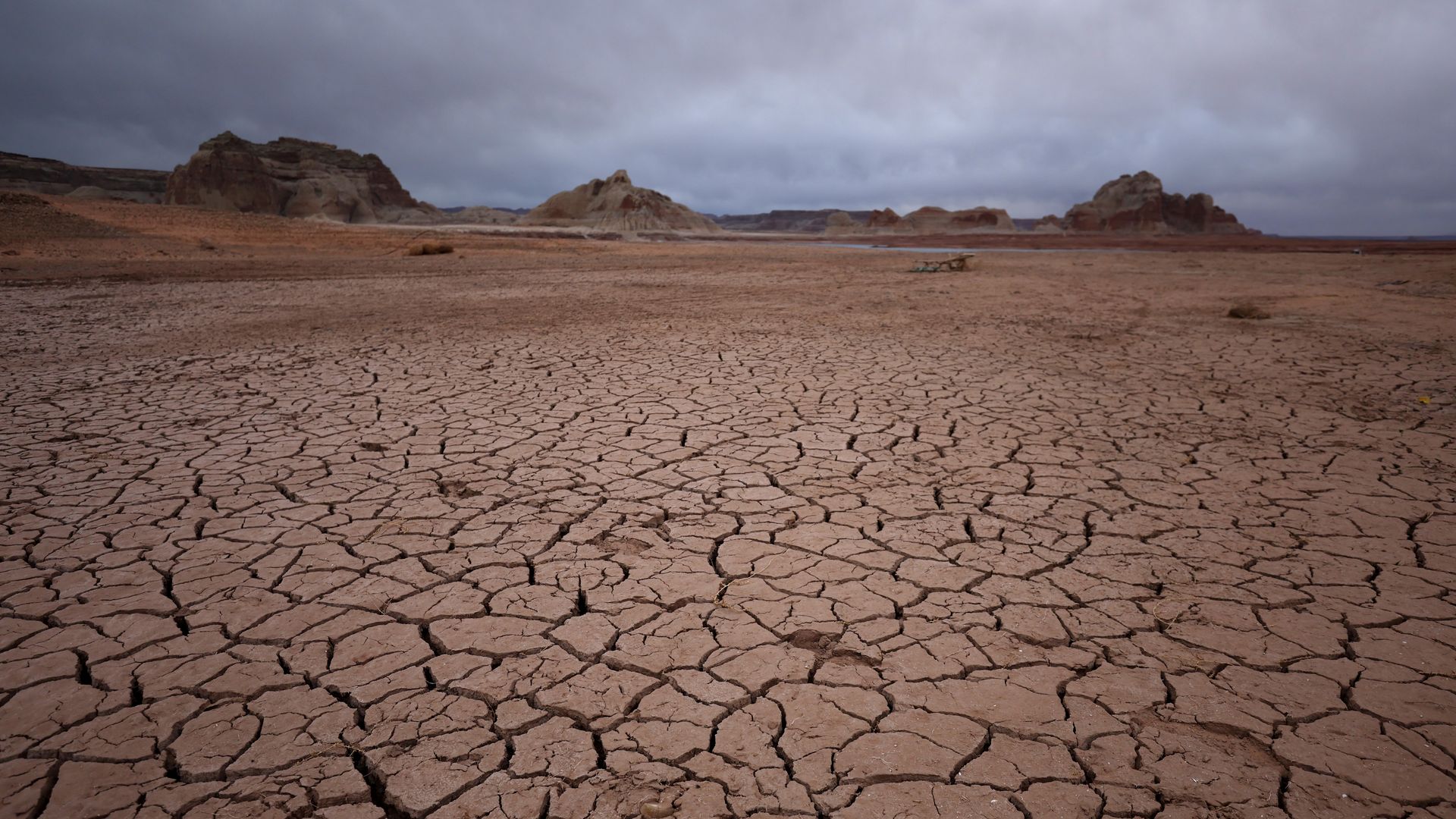 Dry cracked earth is visible in an area of Lake Powell that was previously underwater on March 28, 2022 in Page, Arizona.