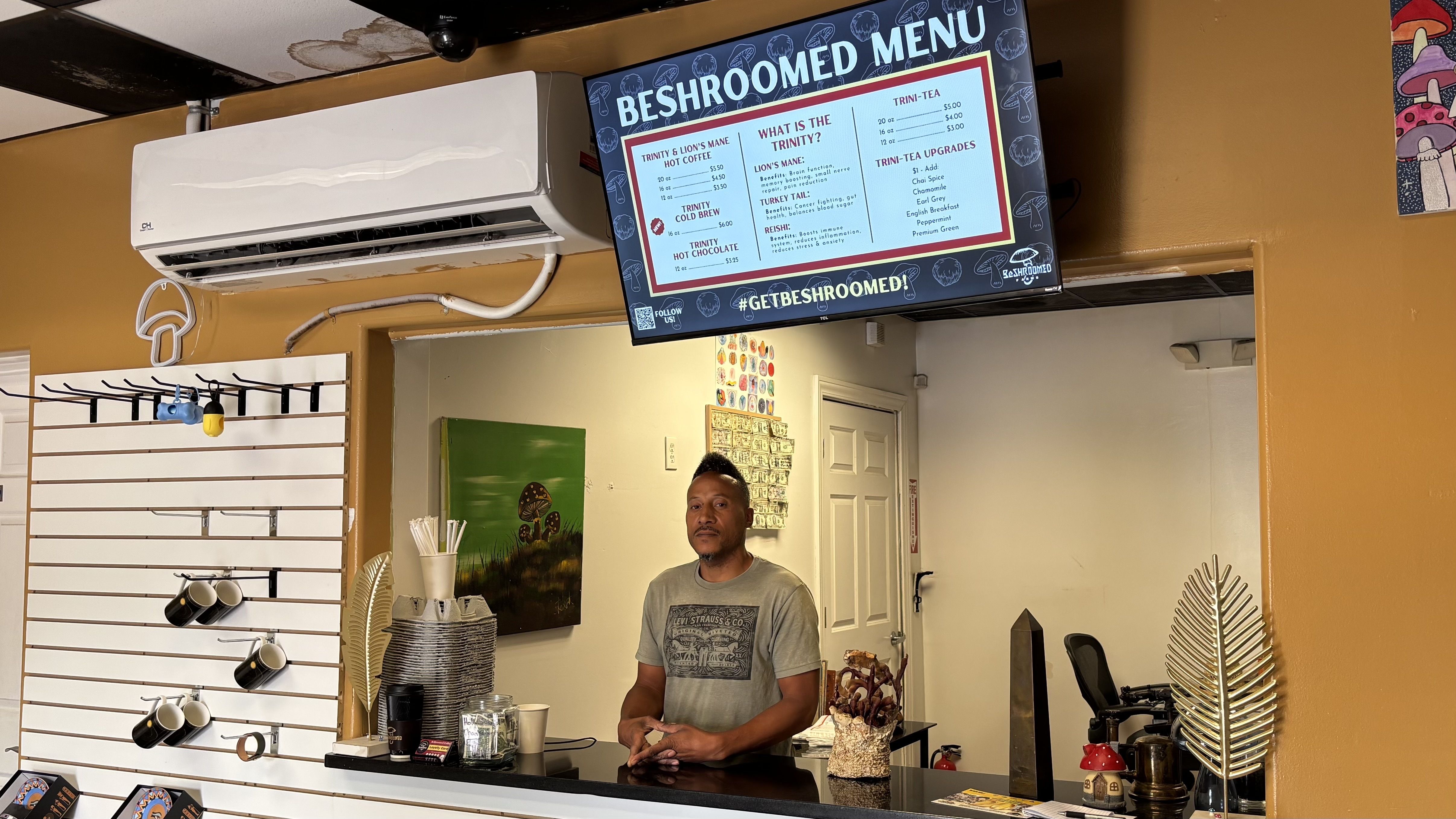 BeShroomed Farms owner Osotrari Washington inside his shop on Detroit's east side.