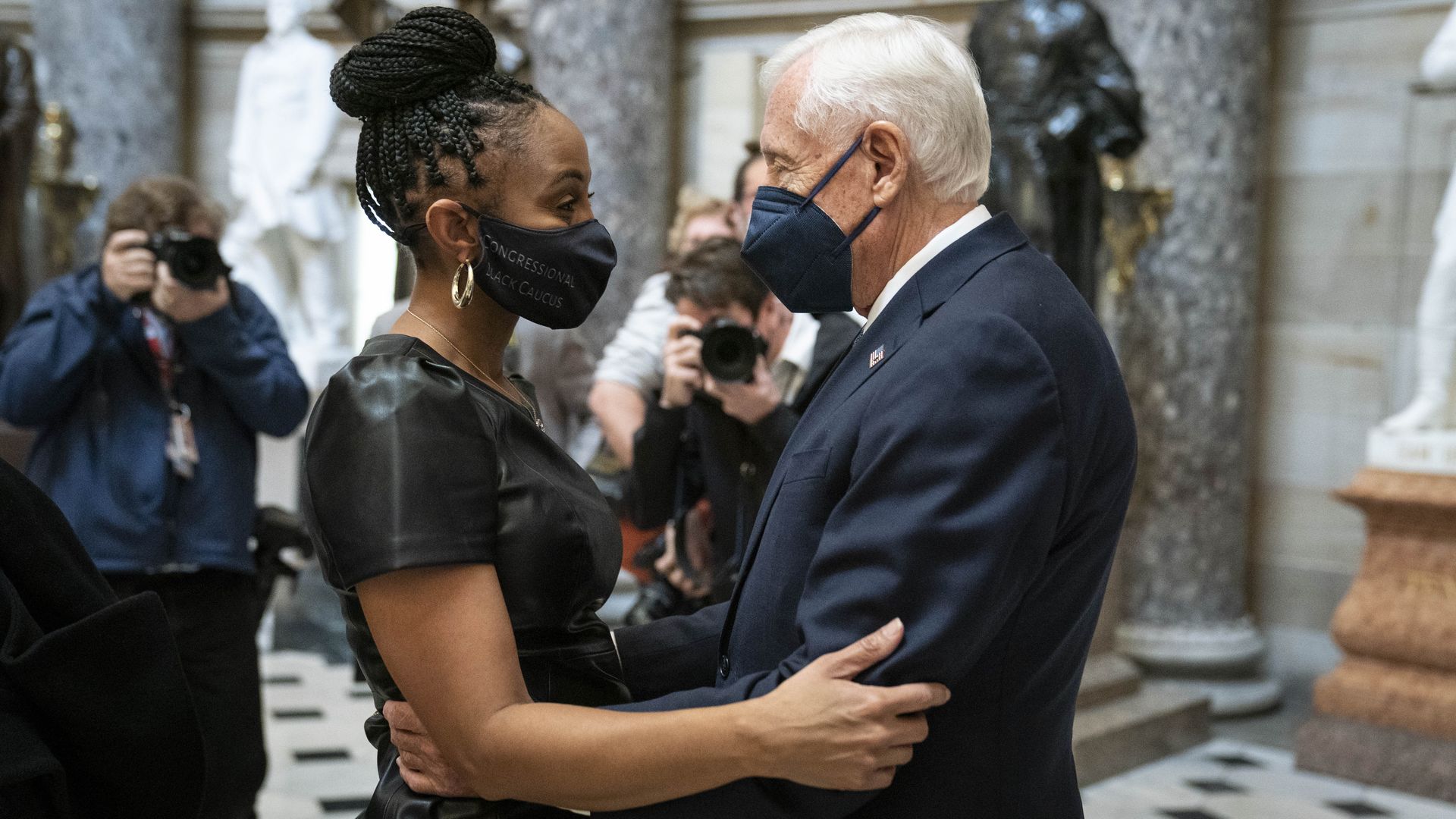 Rep. Shontel Brown is seen embracing House Majority Leader Steny Hoyer.