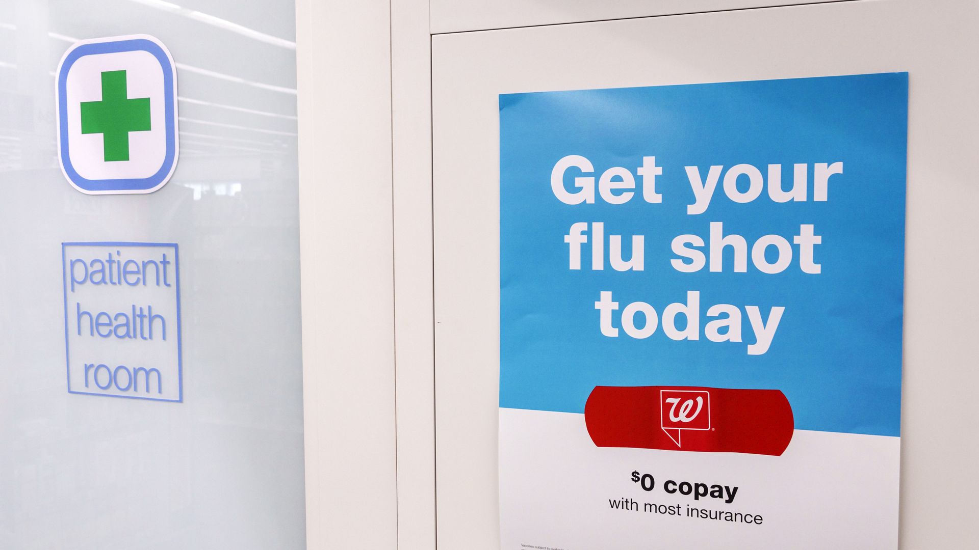 A promotion sign for flu shots.