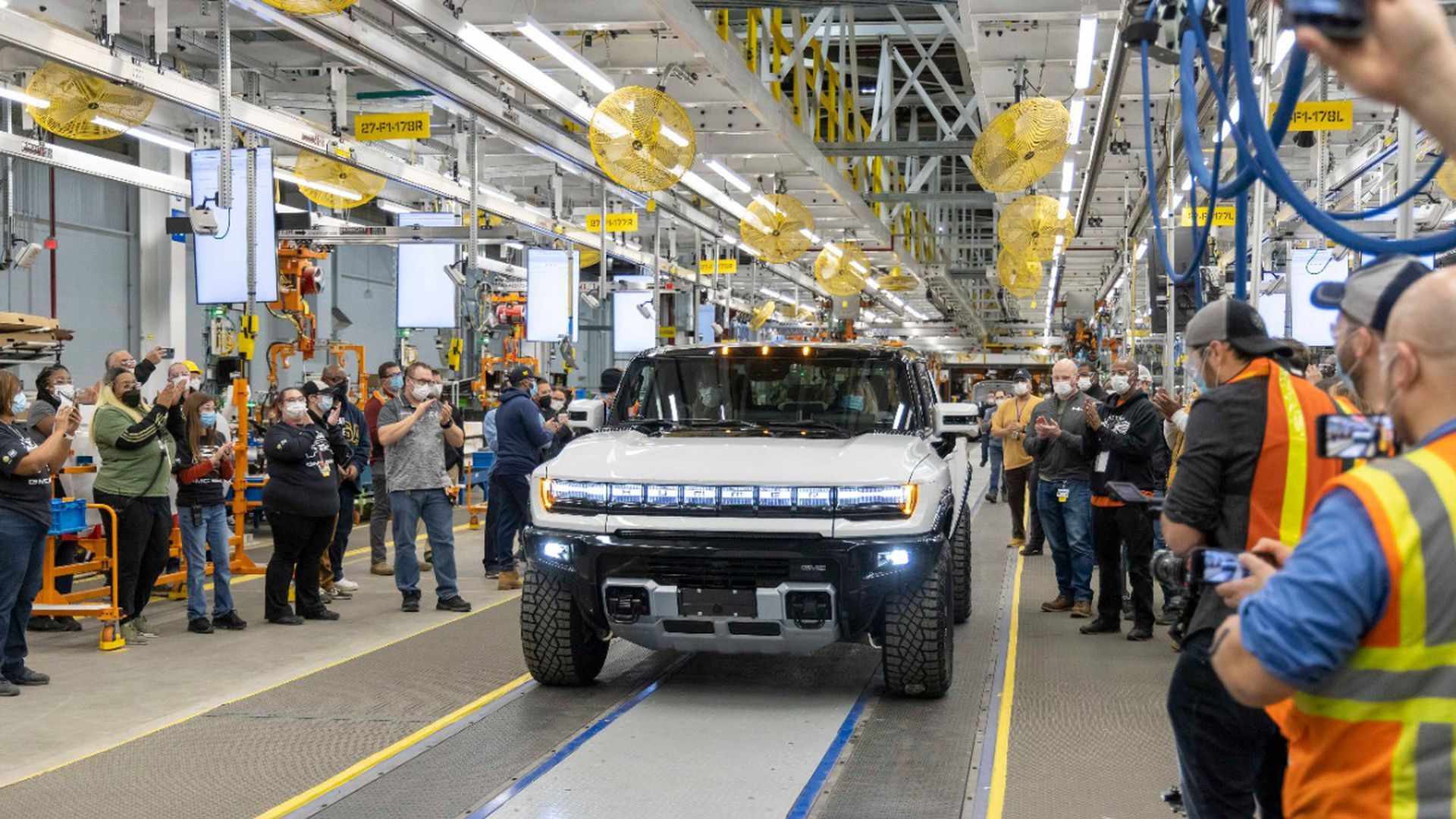 A GMC Hummer EV exits a General Motors factory in Michigan.