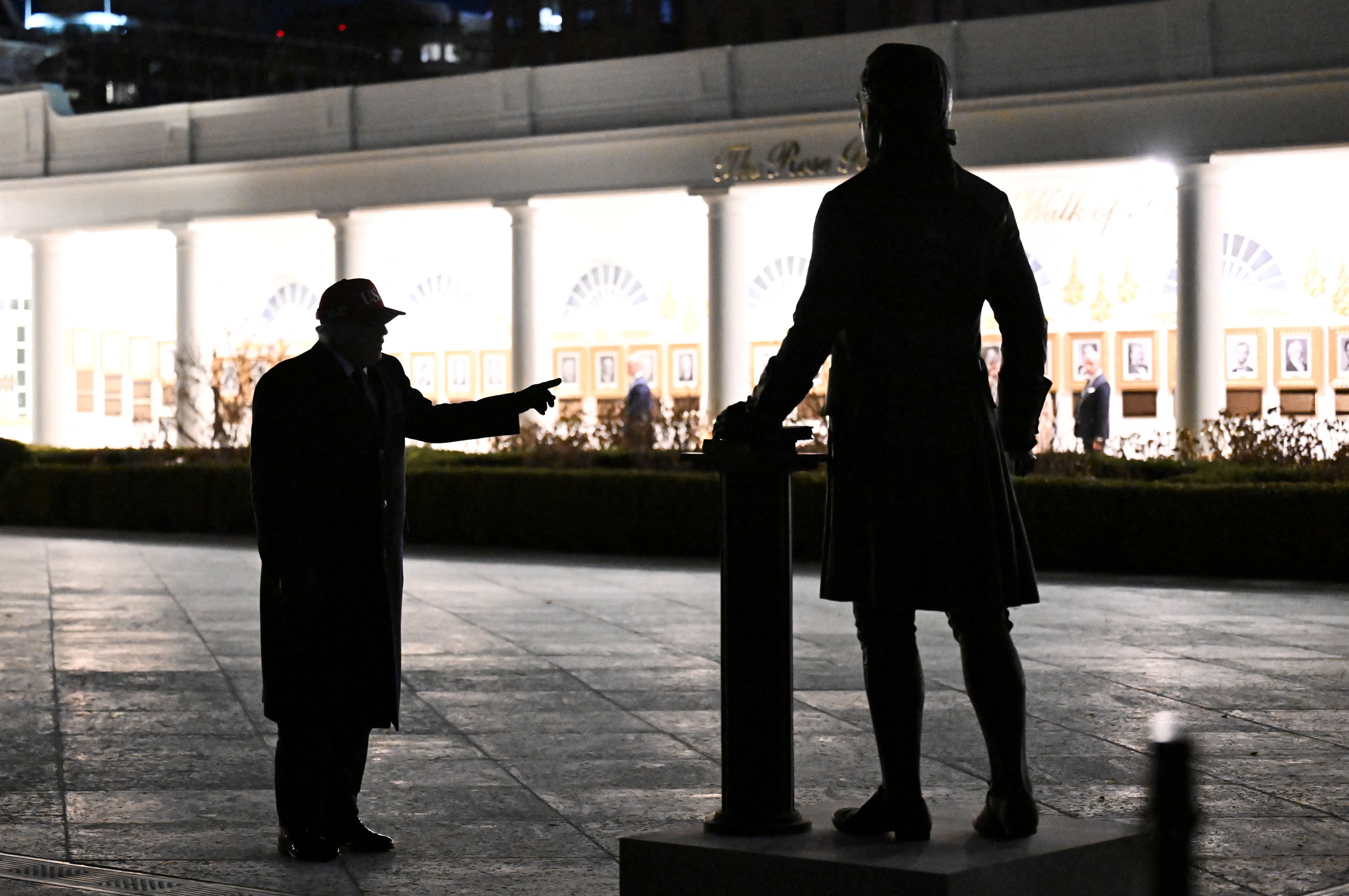 Trump views the newly installed Thomas Jefferson, framed by the new Presidential Walk of Fame visible on the West Colonnade.