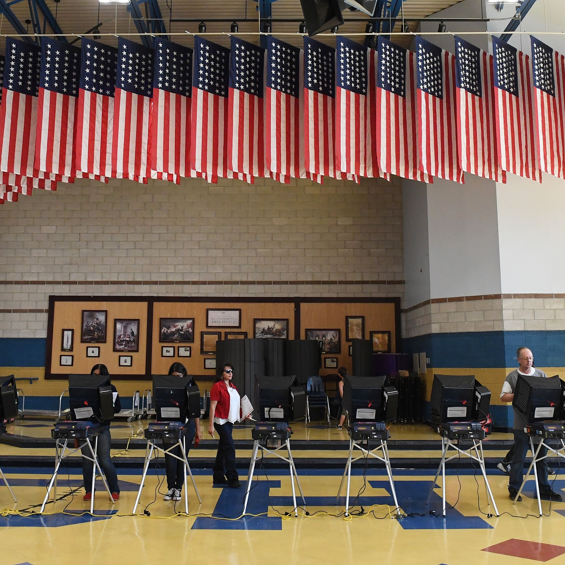 Voters cast their ballots at voting machines at Cheyenne High School on Election Day on November 8, 2016 in North Las Vegas, Nevada. 