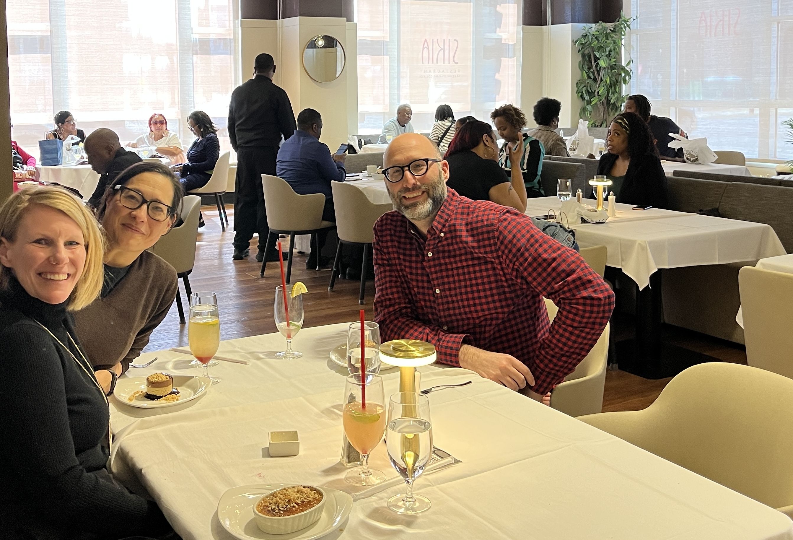 three people at a table