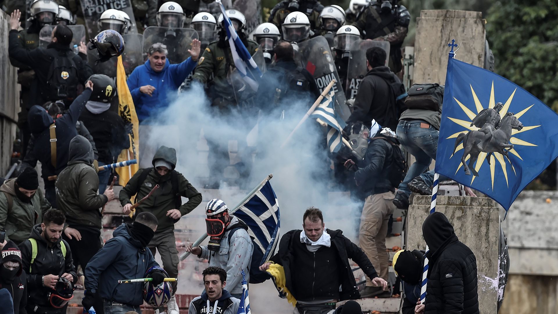 Protesters clash with riot police in Athens on Sunday during a demonstration against the agreement to rename neighbouring country Macedonia as the Republic of North Macedonia. 