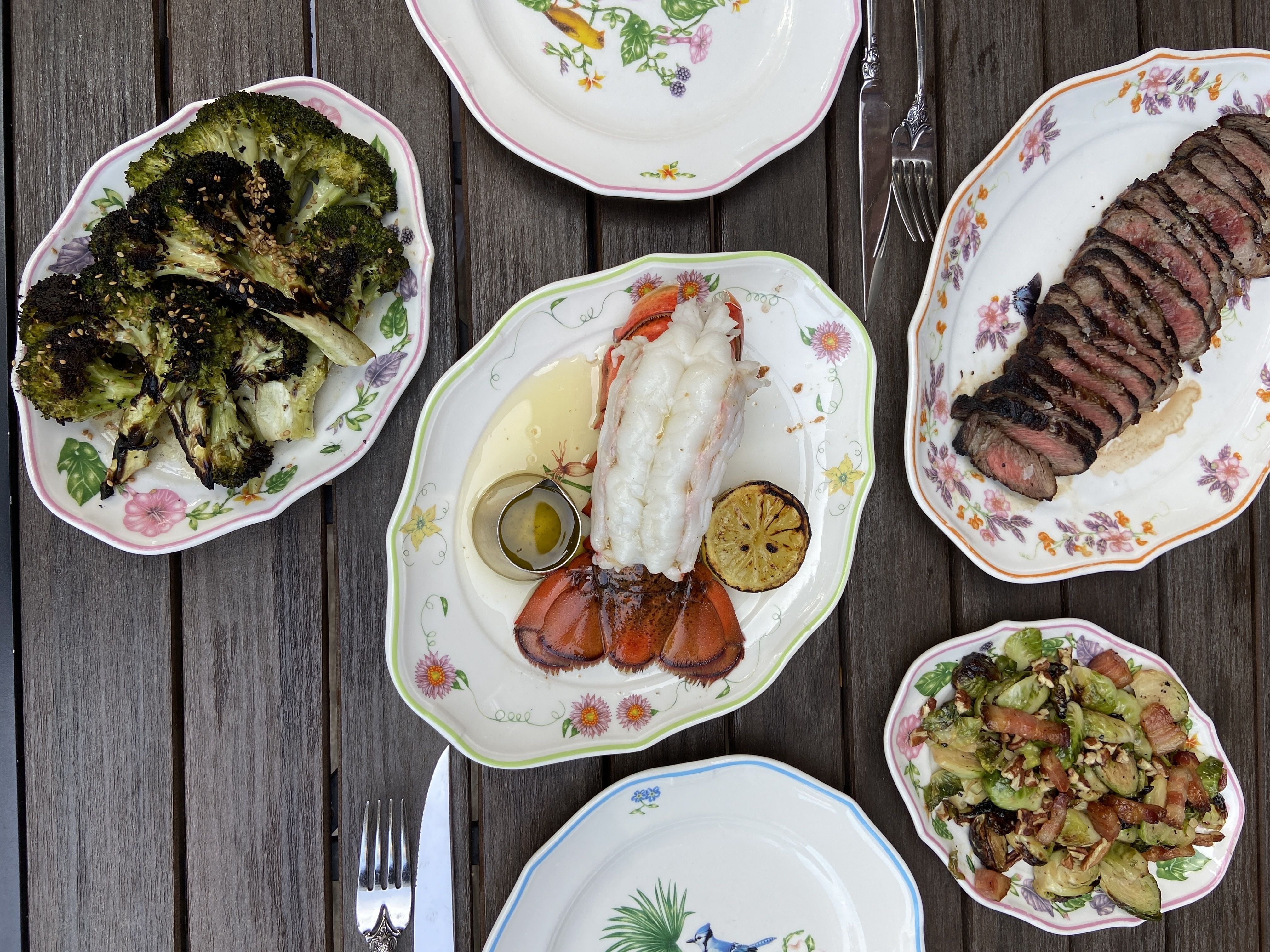 lobster tail, brocoli and steak