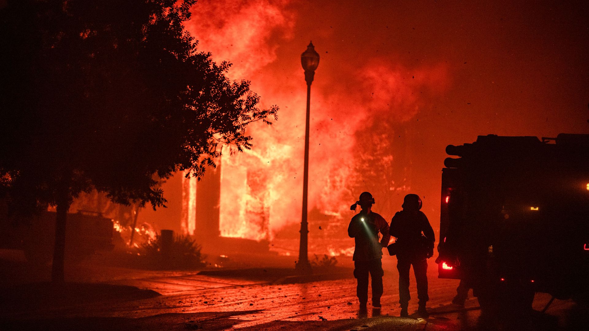 A home bursts into flames from the Shady Fire as it approaches Santa Rosa, California on September 28