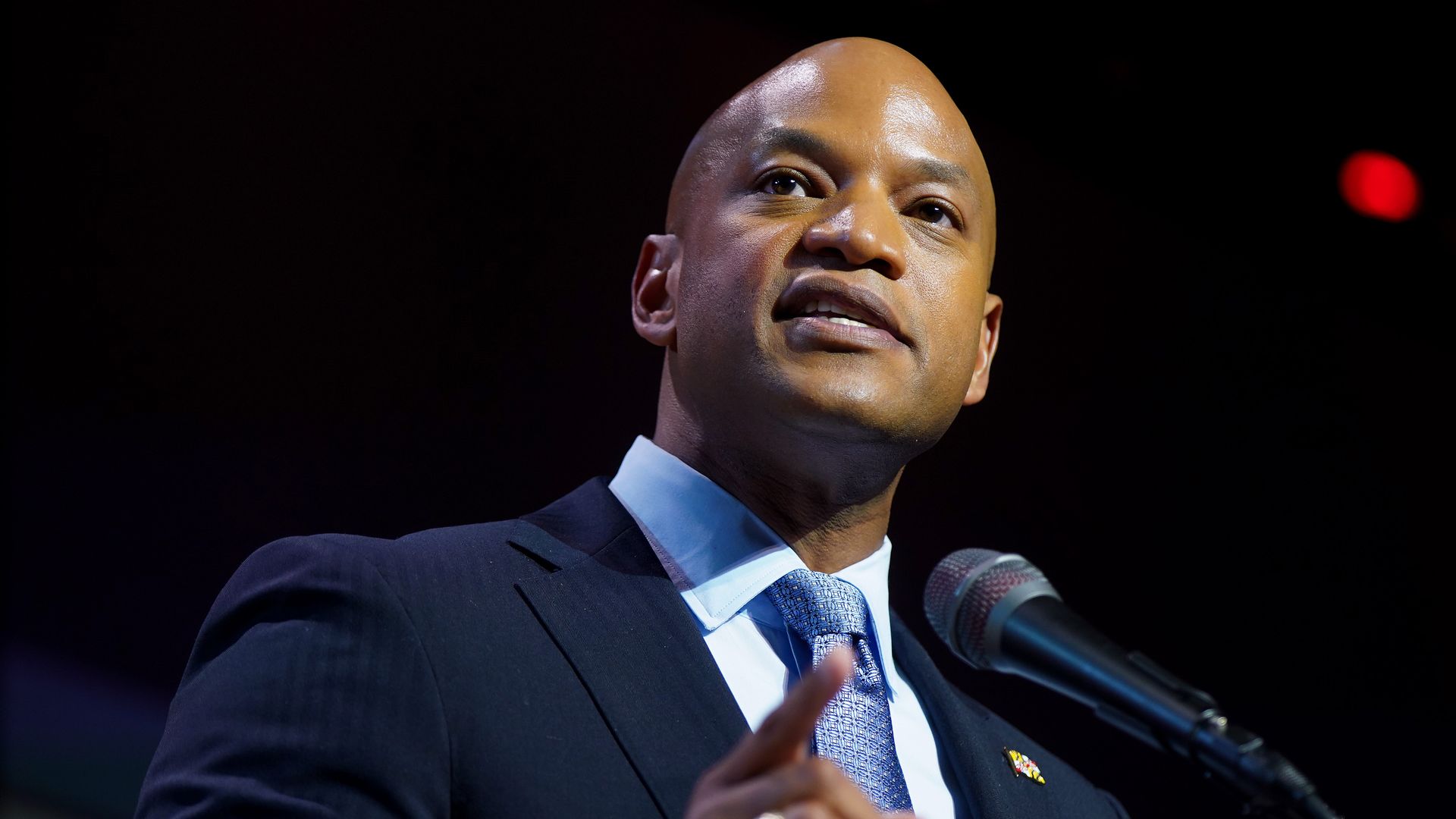 Gov. Wes Moore speaks at a podium.
