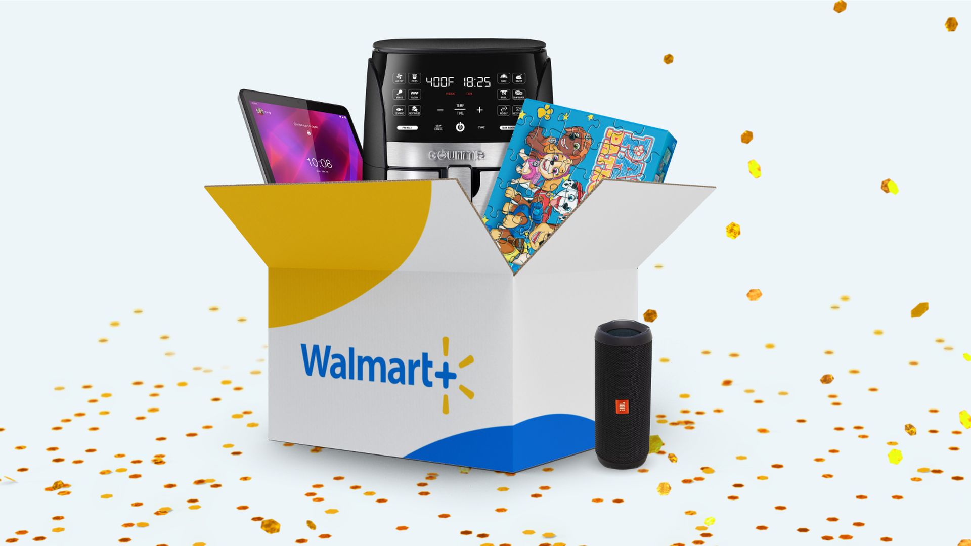 Box that says Walmart+ with a tablet, air fryer and Paw Patrol puzzle inside it, and a speaker next to the box. Surrounded by gold confetti