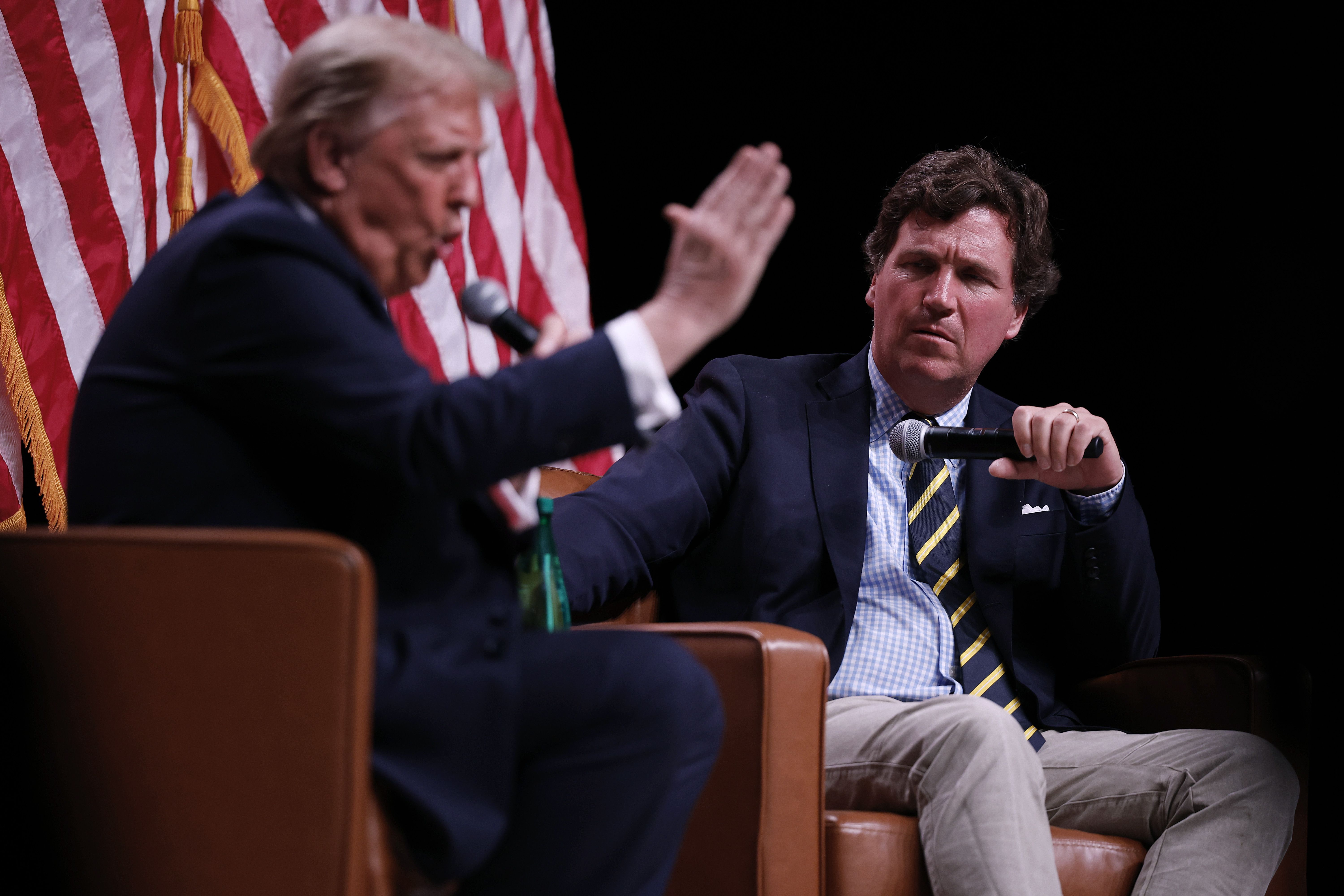 Tucker Carlson interviews President Trump during the campaign last year.
