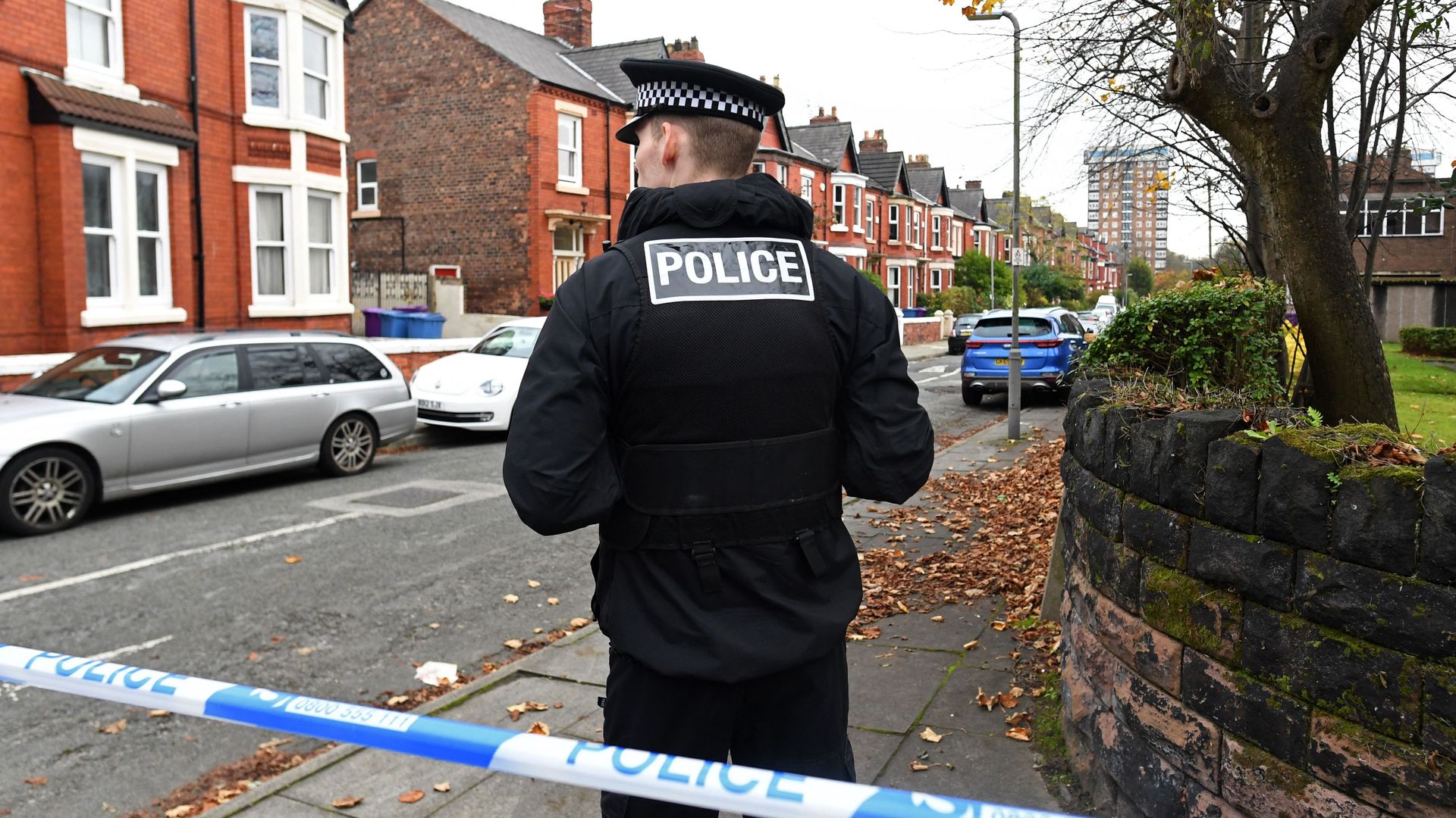 A police officer standing guard near the bomb site in Liverpool on Nov. 15.