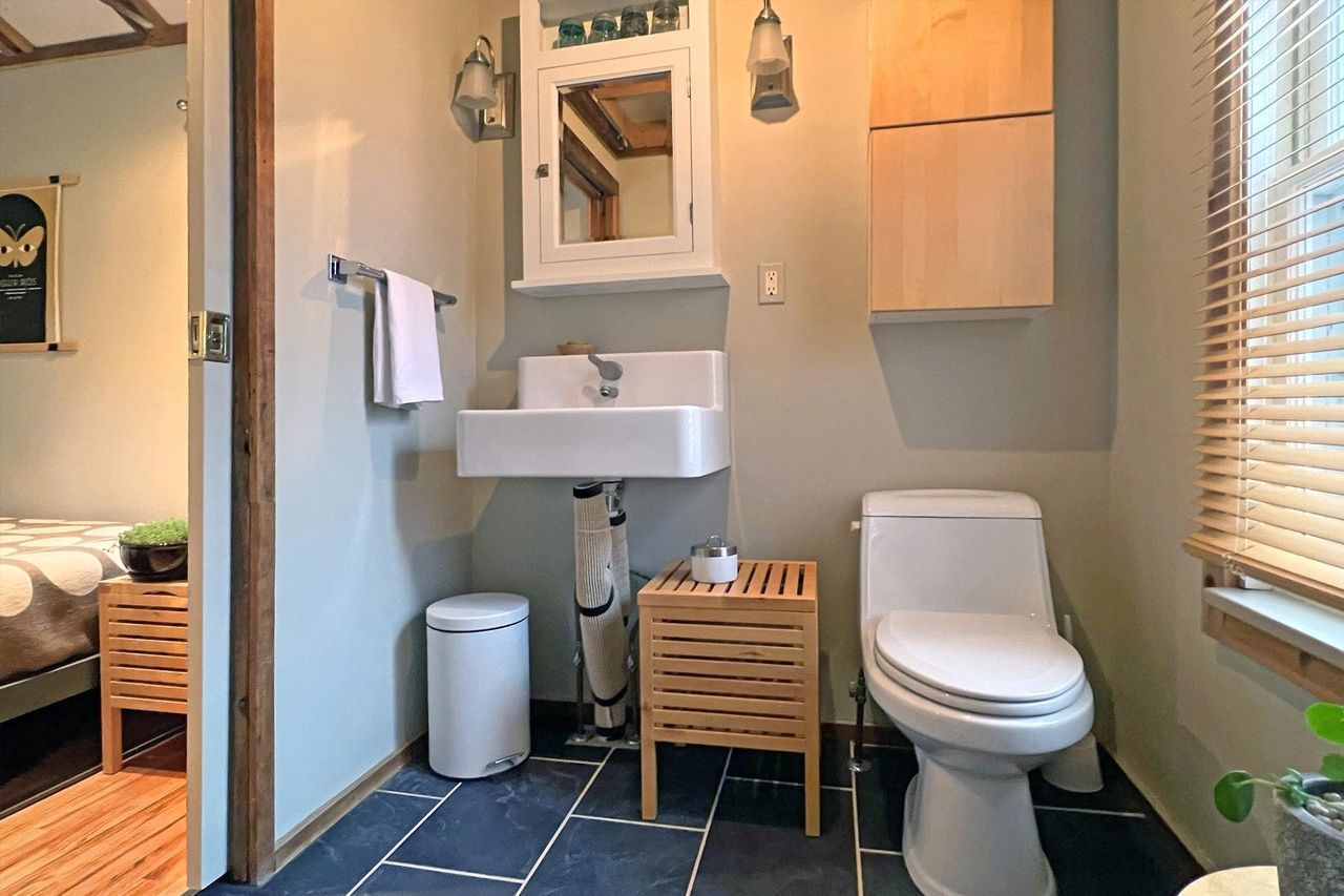 tiny home full bathroom with slate tile