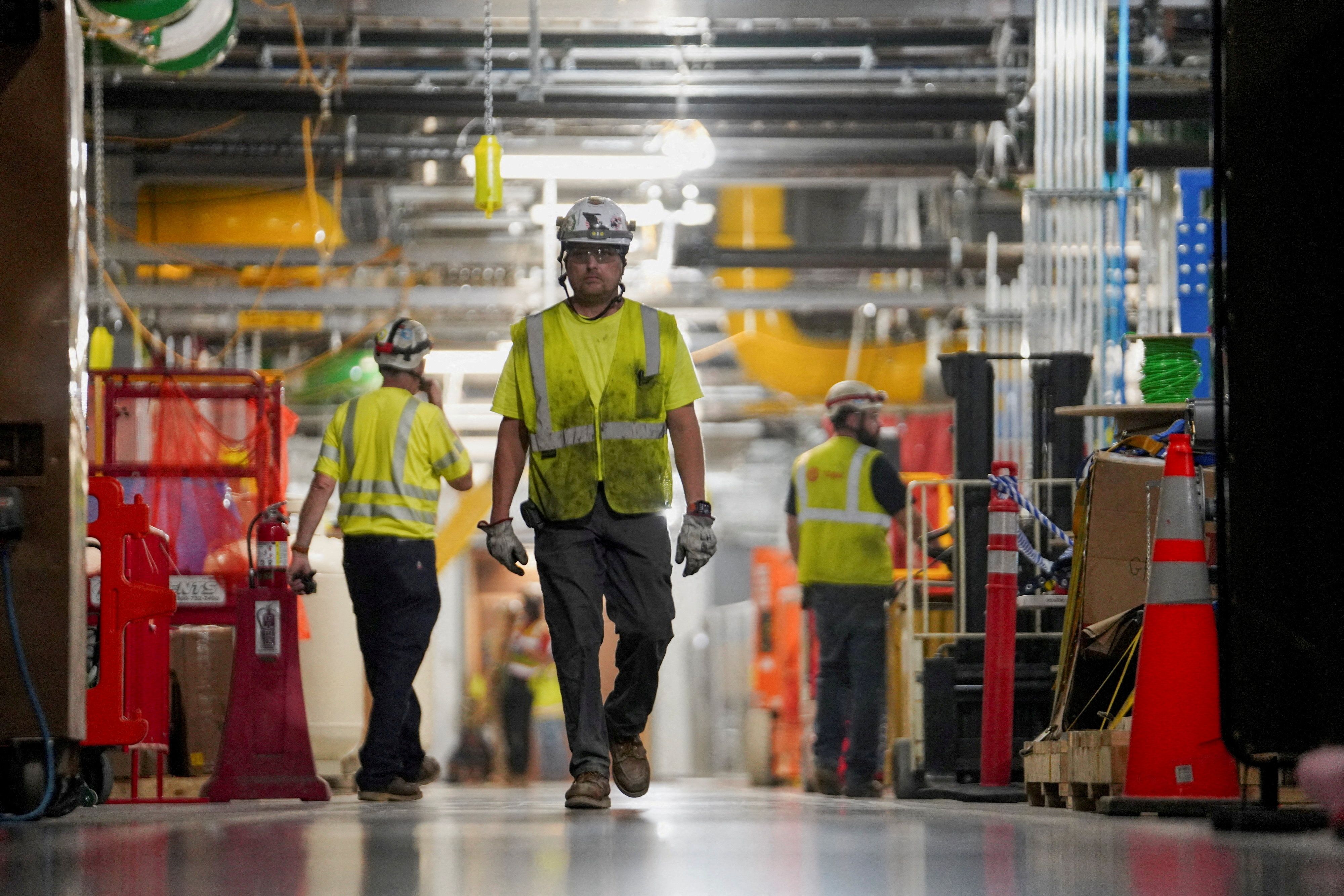 Workers building a data center