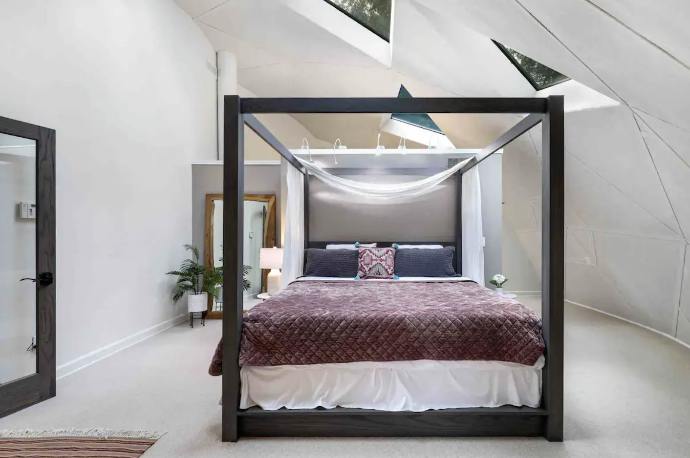 bedroom area with canopy bed
