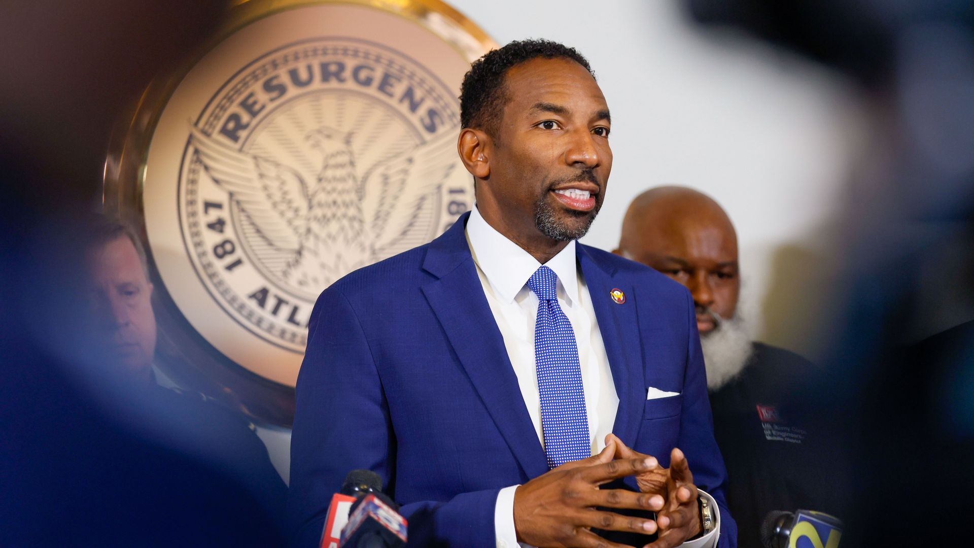 Mayor Andre Dickens speaks at a press conference