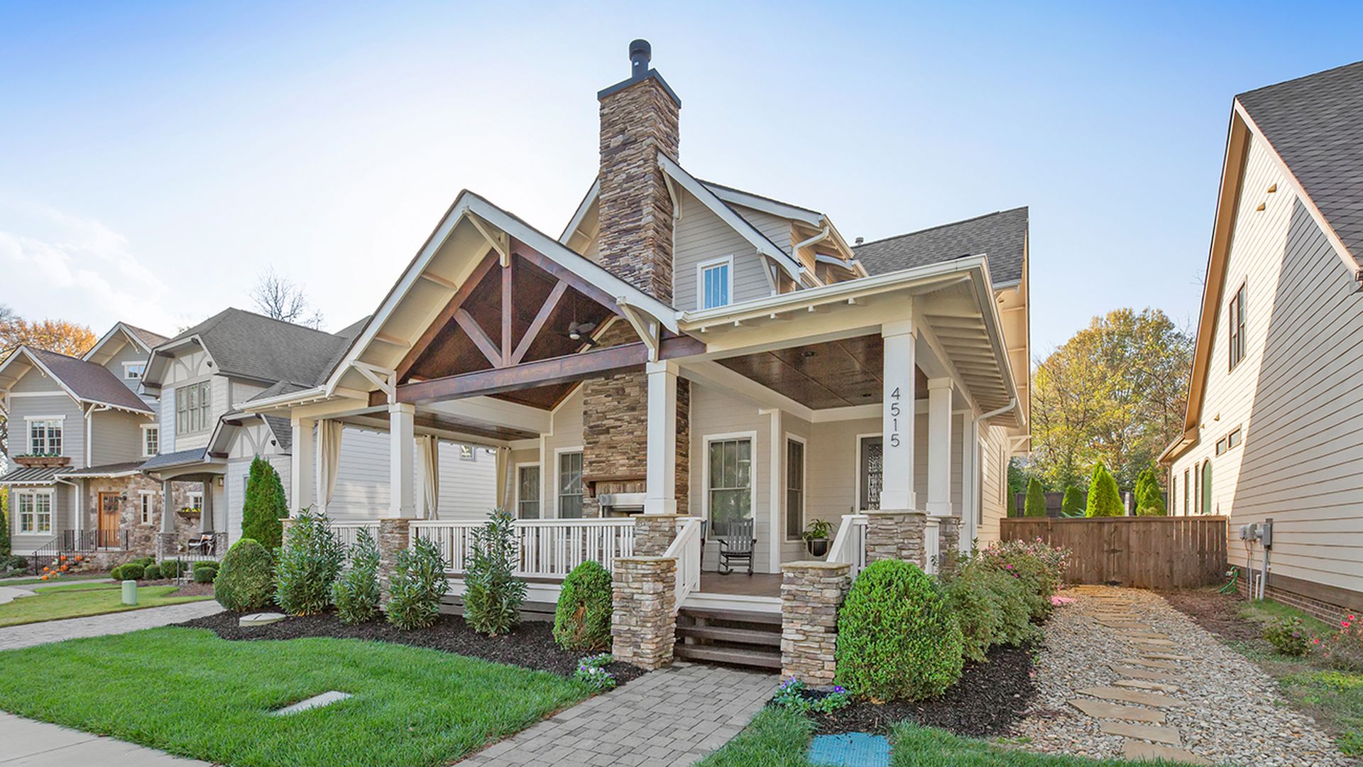Big brick house with chimney out front