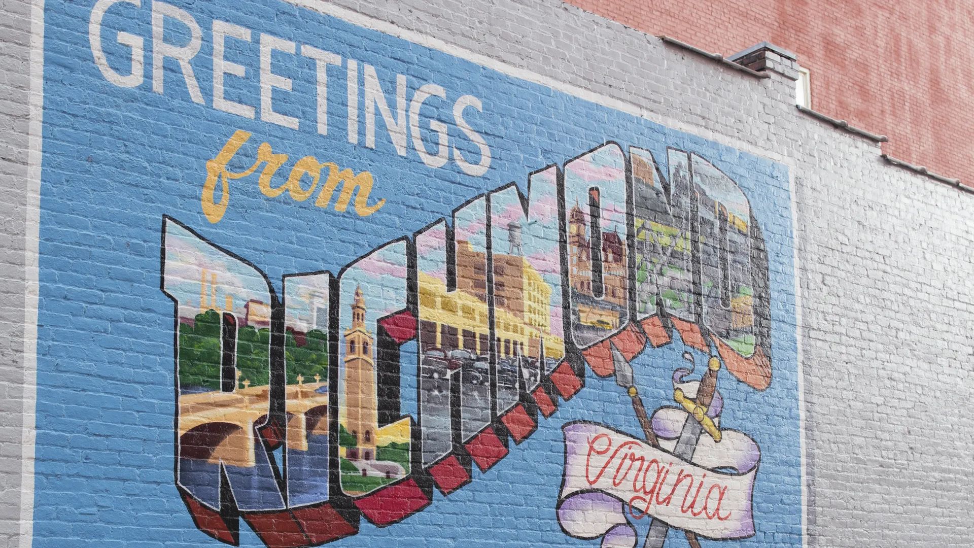 a postcard-style mural that says "greetings from richmond, virginia"