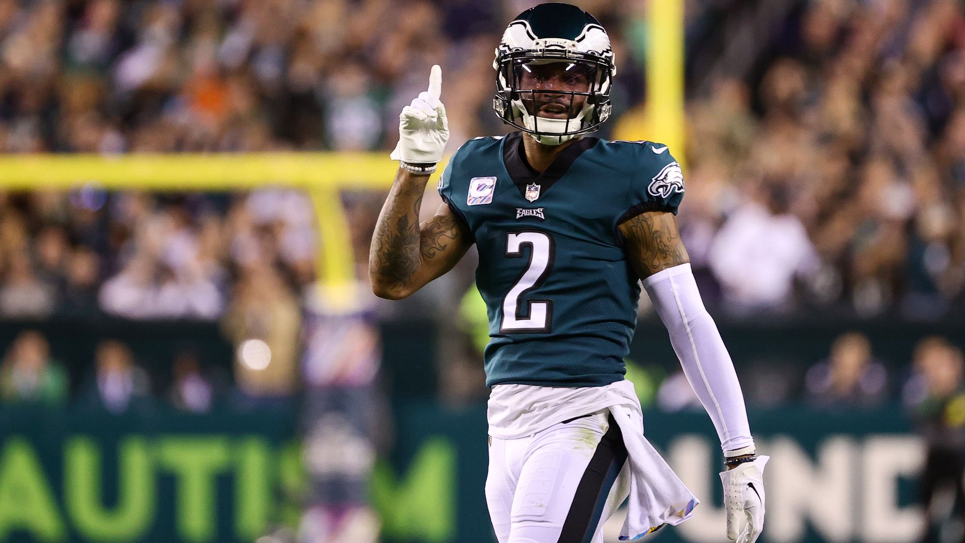 Eagles cornerback Darius Slay holds up No. 1 finger.
