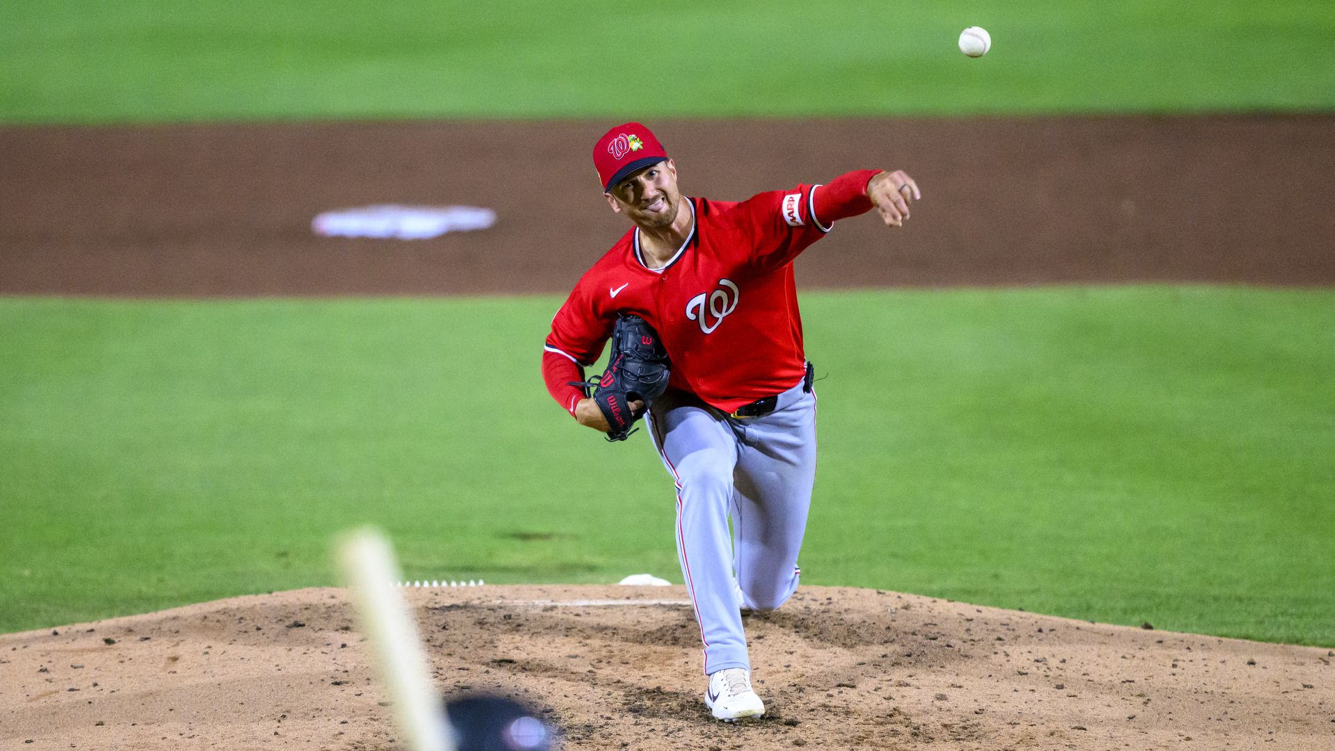 Nats pitcher throws ball from the mound during spring training