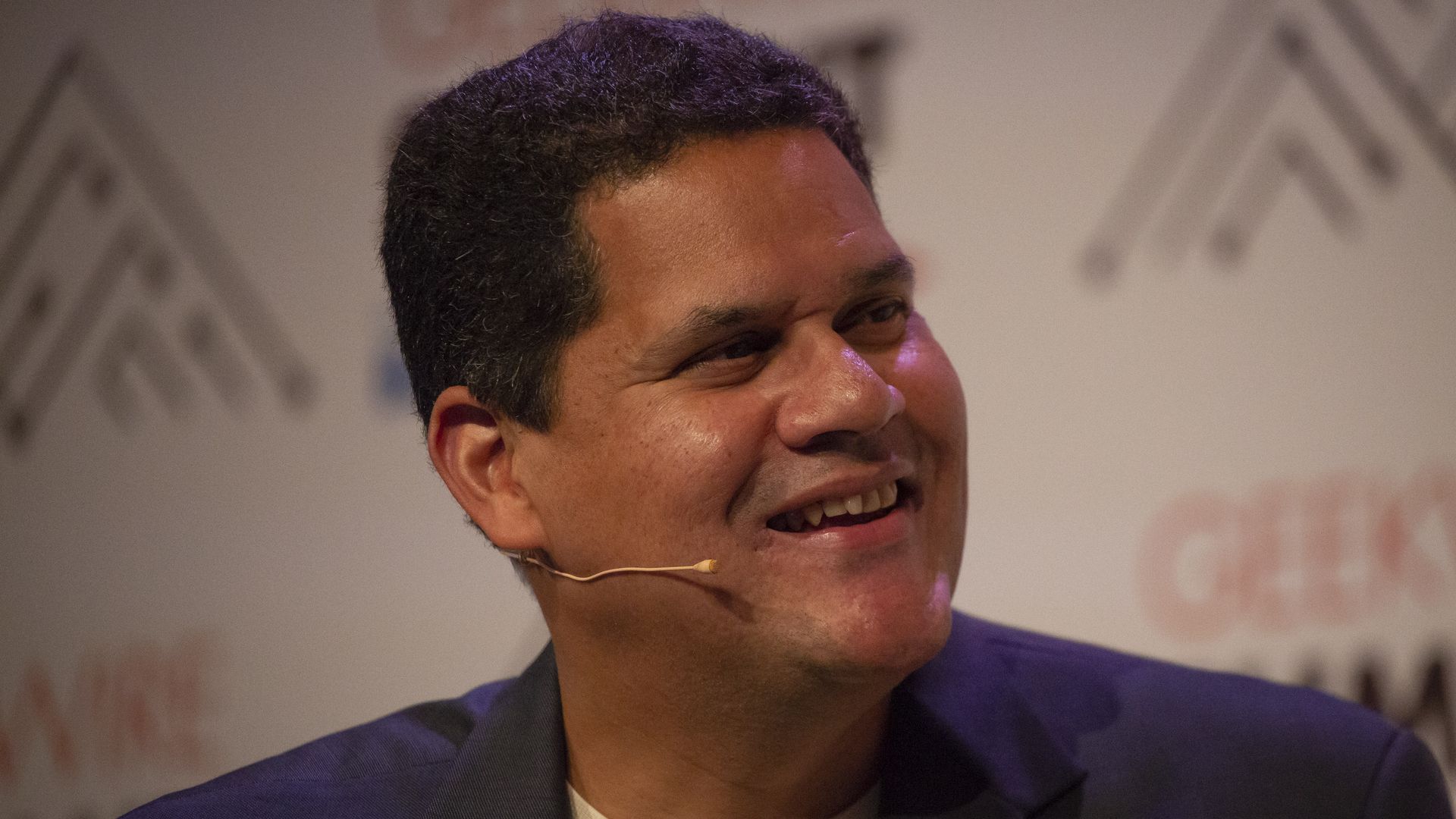 Headshot of Reggie Fils-Aime in sport jacket and crewneck shirt