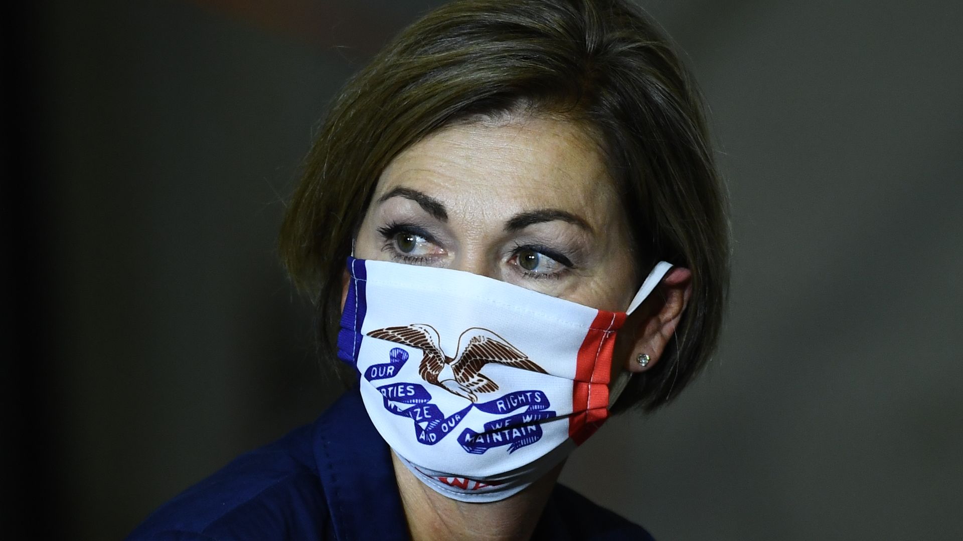 Iowa Gov. Kim Reynolds wearing a face mask.