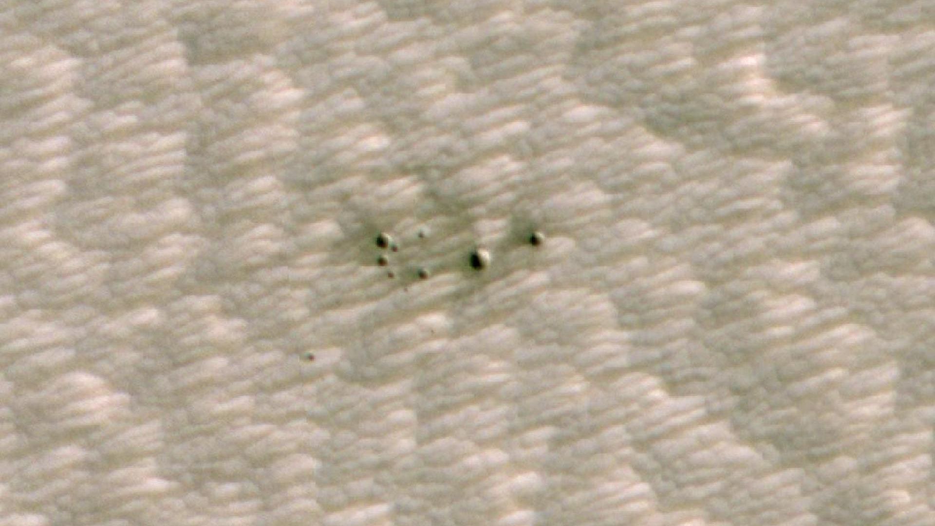 Craters on Mars spotted by AI. Photo: NASA/JPL-Caltech/University of Arizona