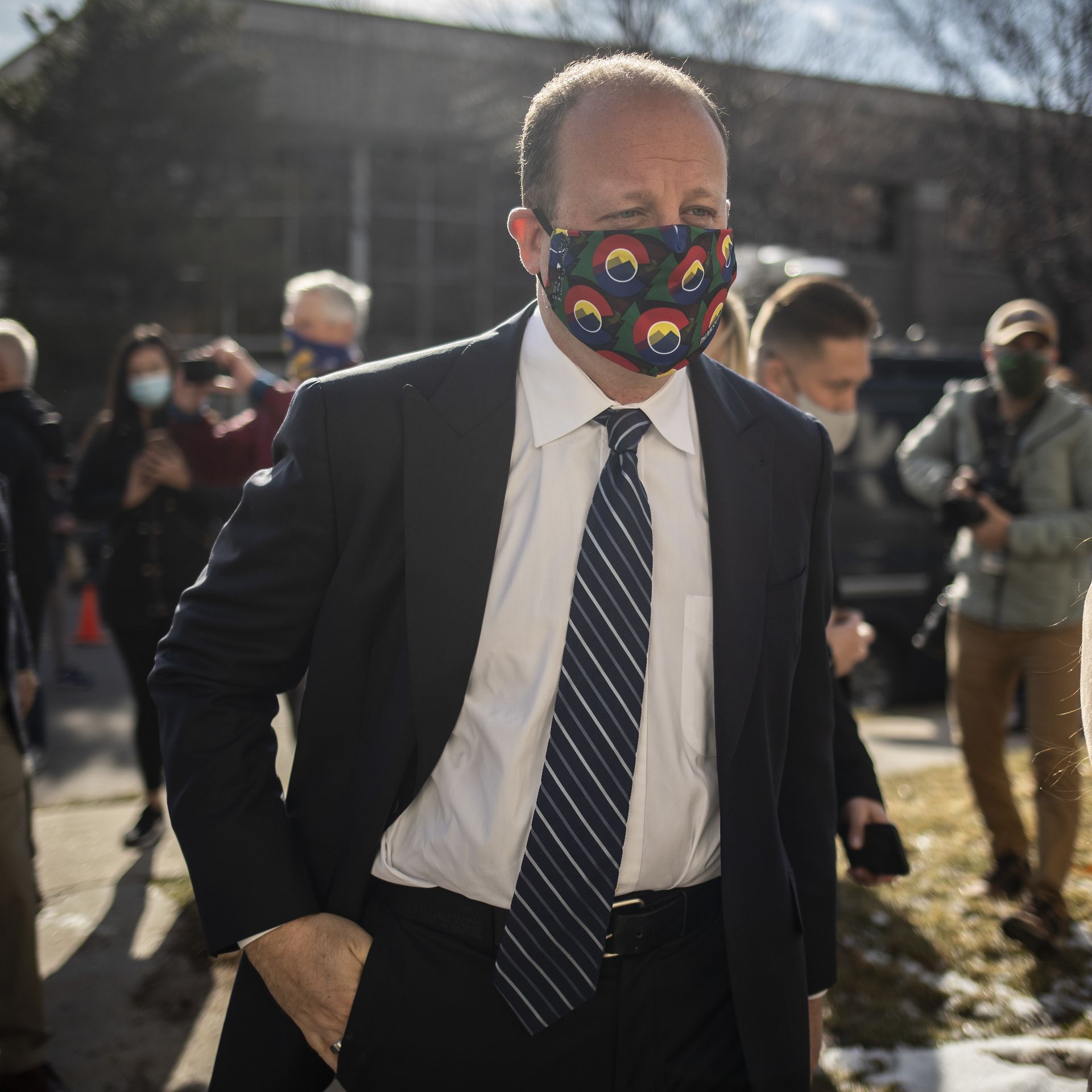  Colorado Governor Jared Polis leaves a press conference the morning after a gunman opened fire at a King Sooper's grocery store on March 23, 2021 in Boulder, Colorado. 