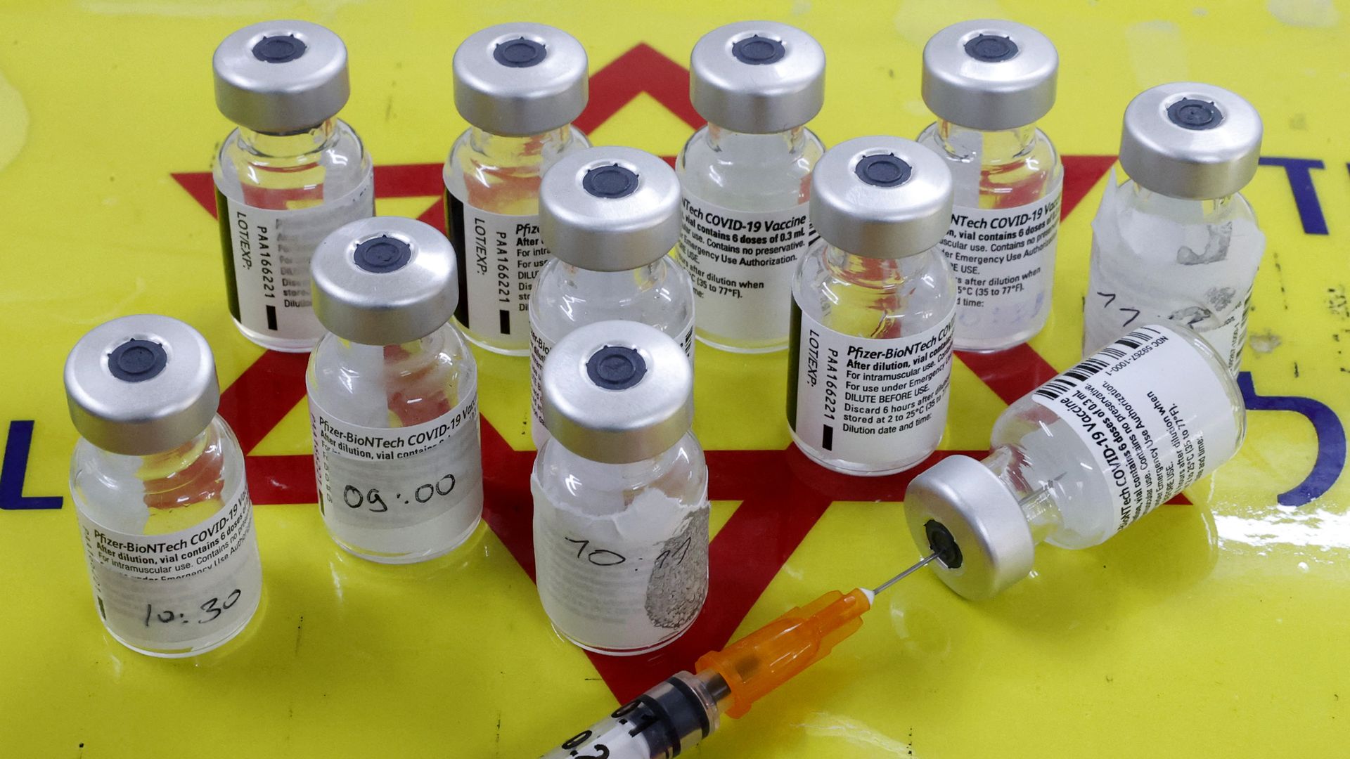 Vials of the Pfizer/BioNTech Covid-19 vaccine are pictured at a Magen David Adom mobile vaccination centre during a campaign by the Tel Aviv-Yafo Municipalit