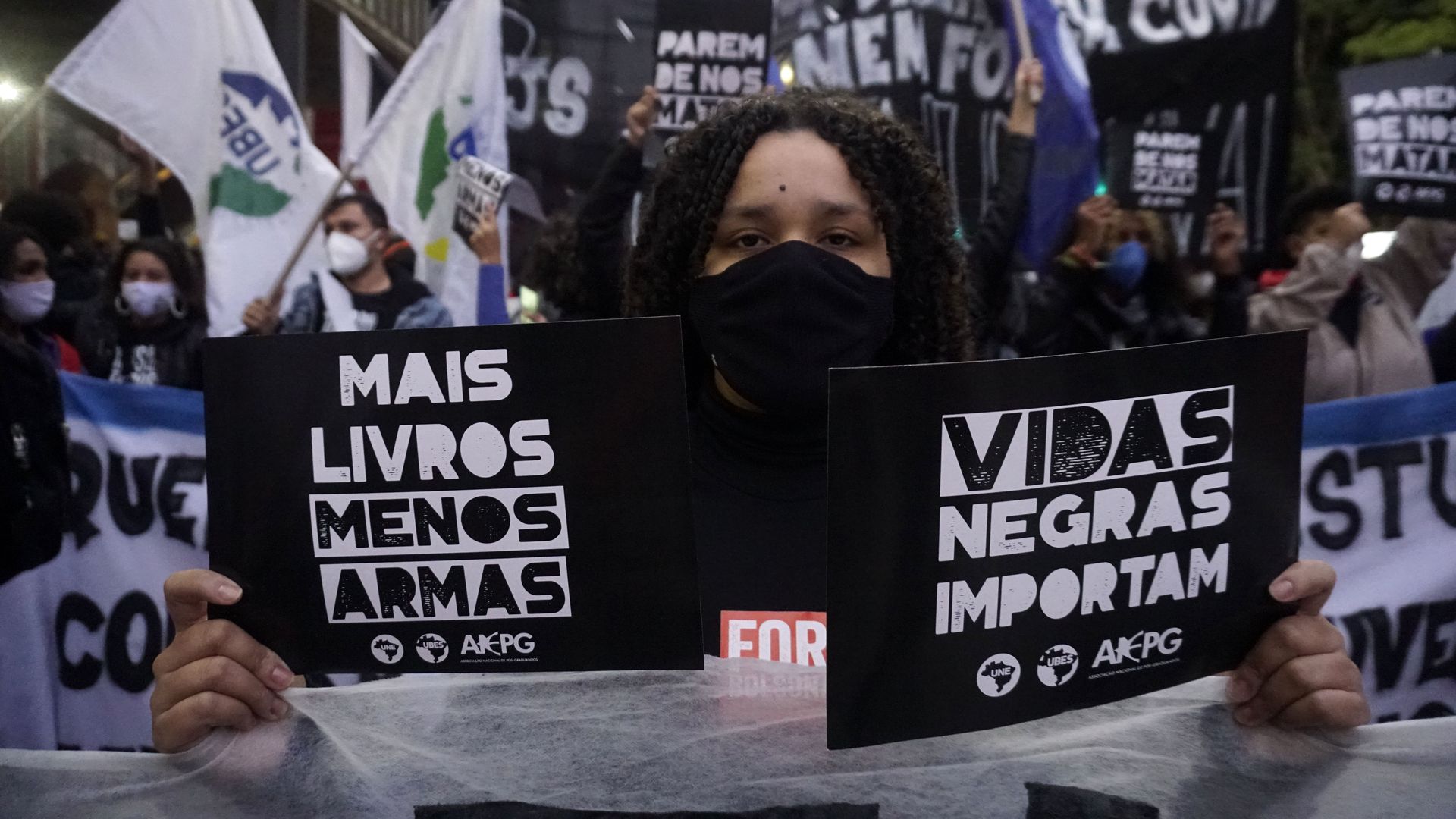 People take part in a protest during the National Day Against Racism conmemorating the 133rd anniversary of the Slavery abolition in Brazil at Paulista Avenue in Sao Paulo, Brazil