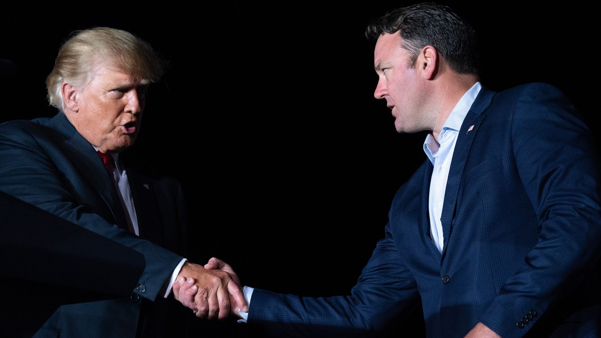 Trump shakes hands with Burt Jones