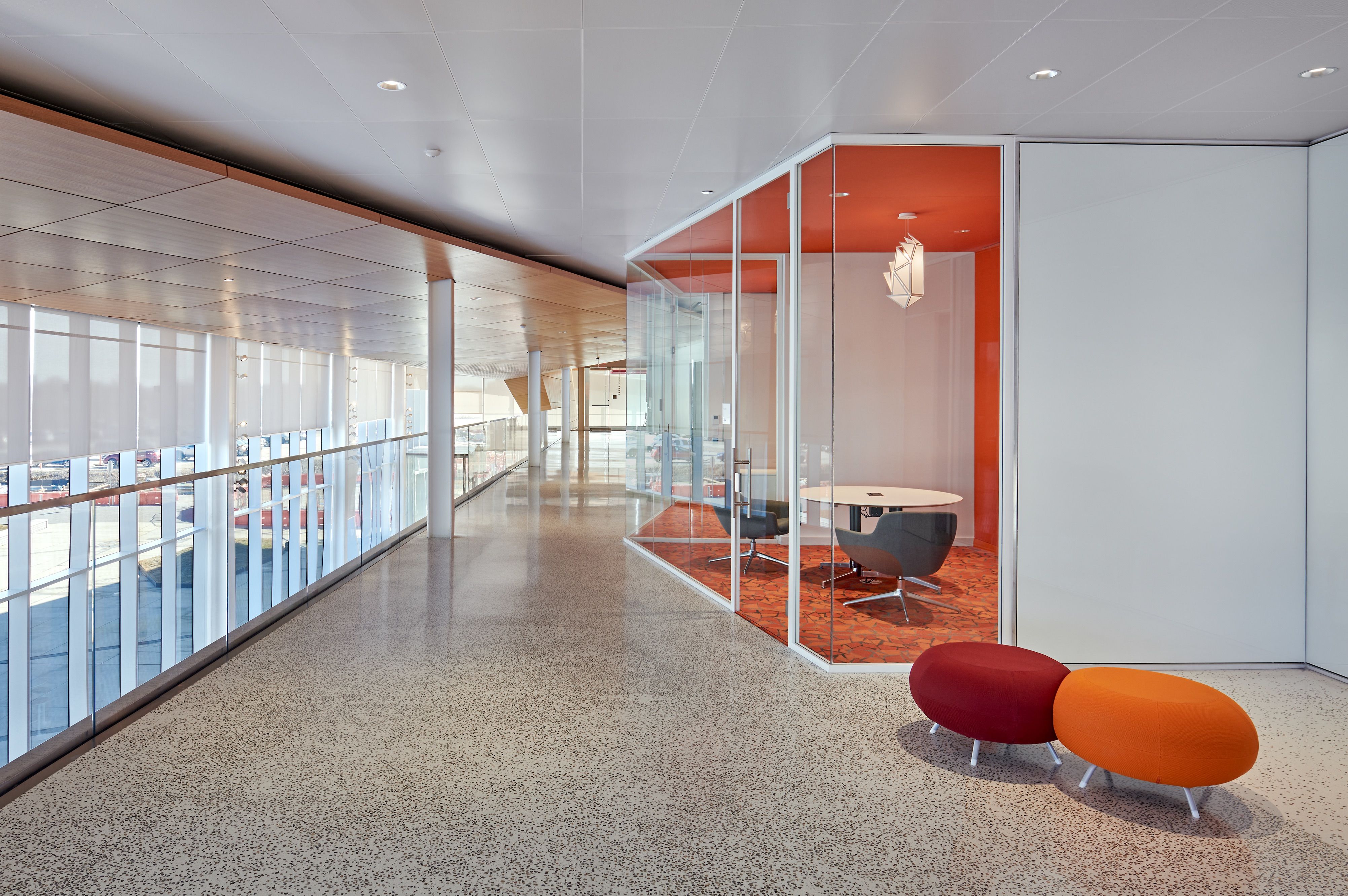 A photo of a classroom in a glass building.