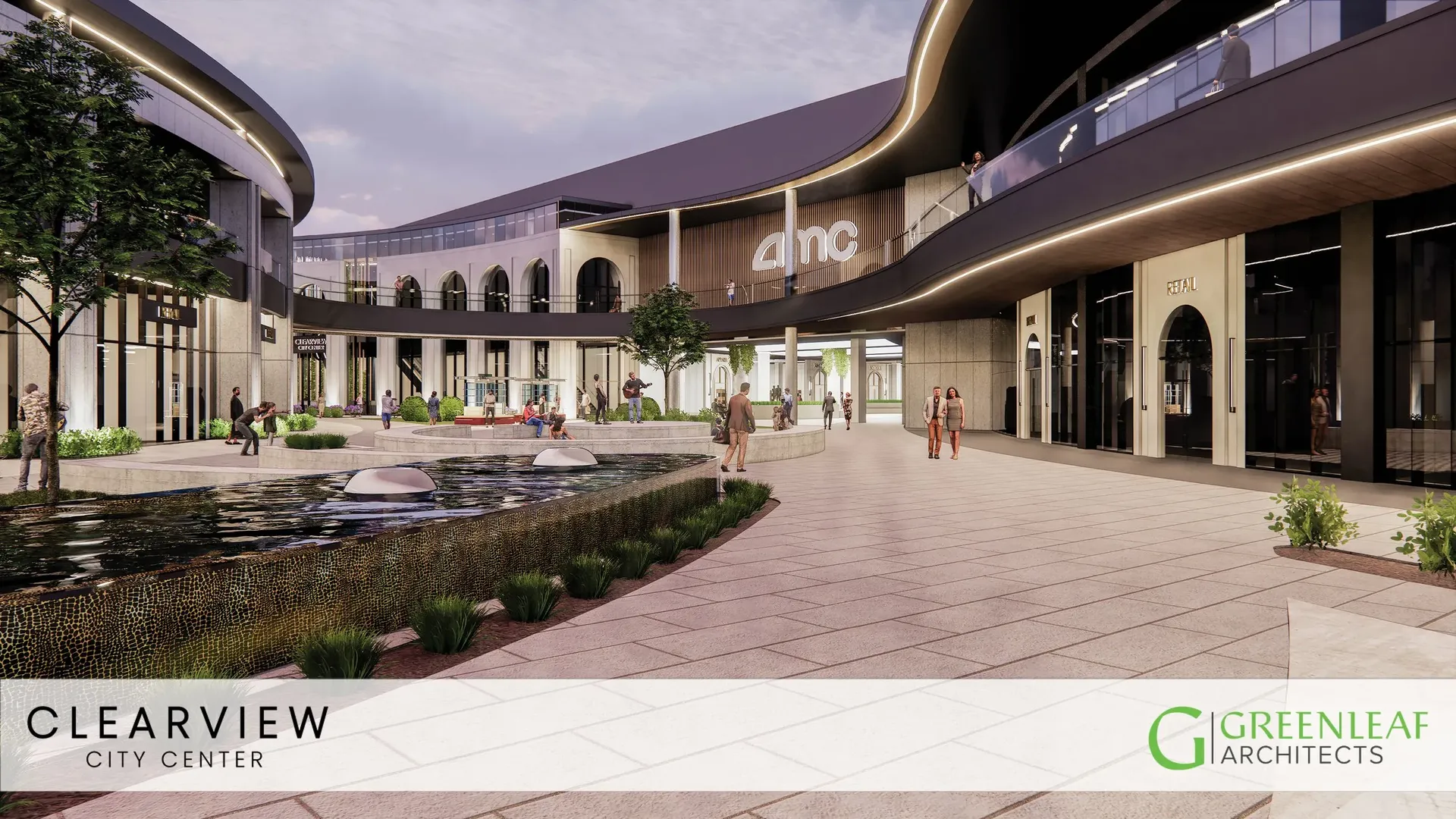 Modern open-air shopping center with curved elevated walkways, glass railings, and storefronts. Central courtyard features a water fountain, trees, and people strolling; AMC sign visible.