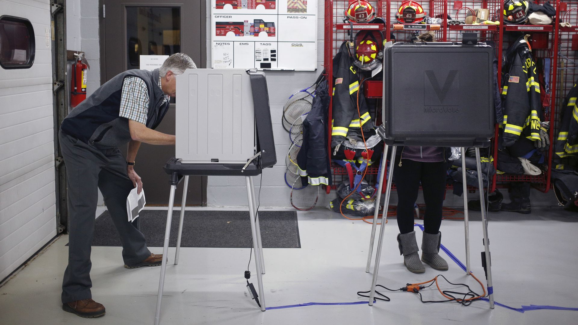 Voters cast ballots at a Carmel Fire Department station.