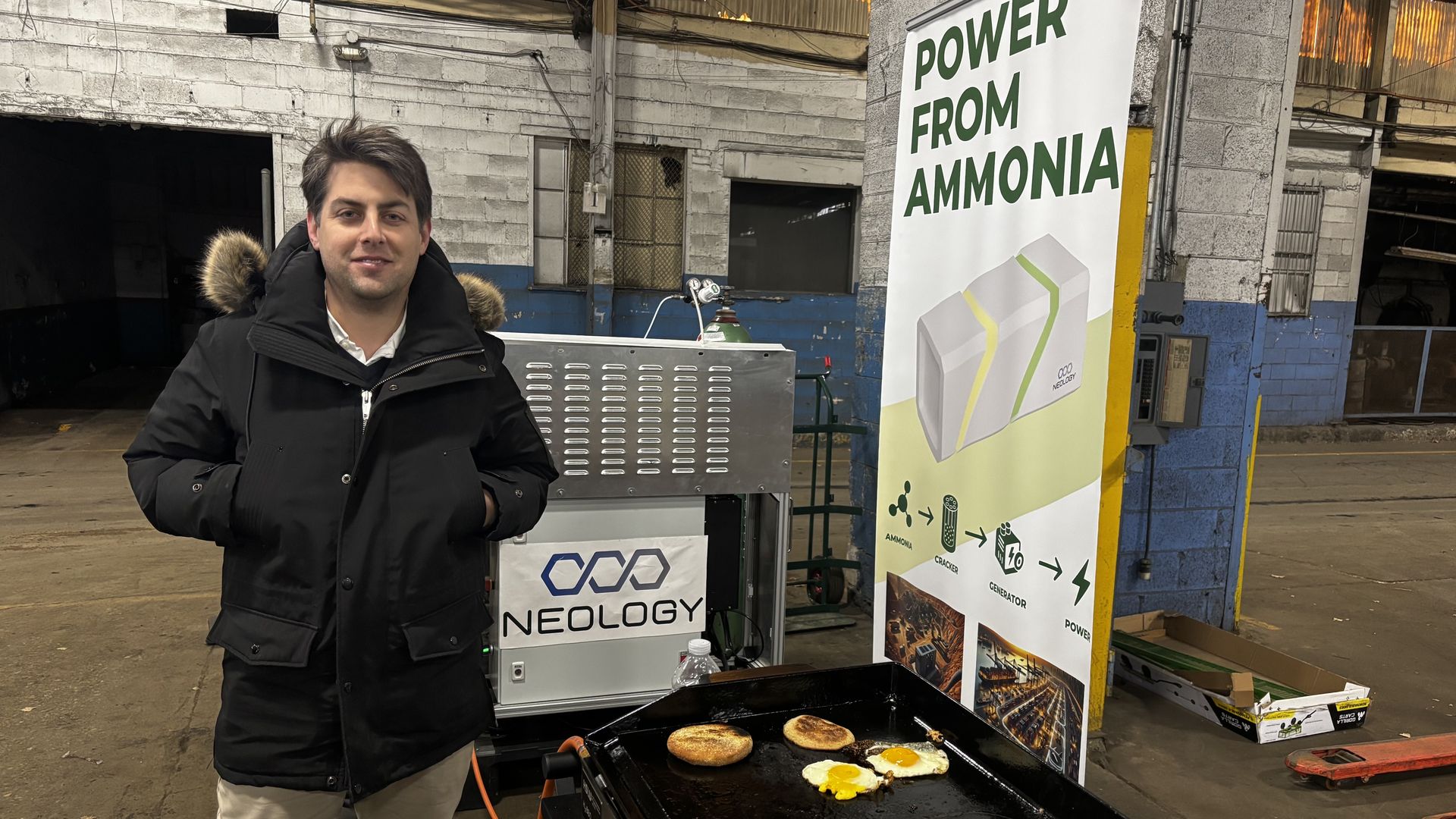 Neology founder and CEO Aris Maroonian stands beside his company's technology in Detroit, where it is powering a grill cooking eggs.