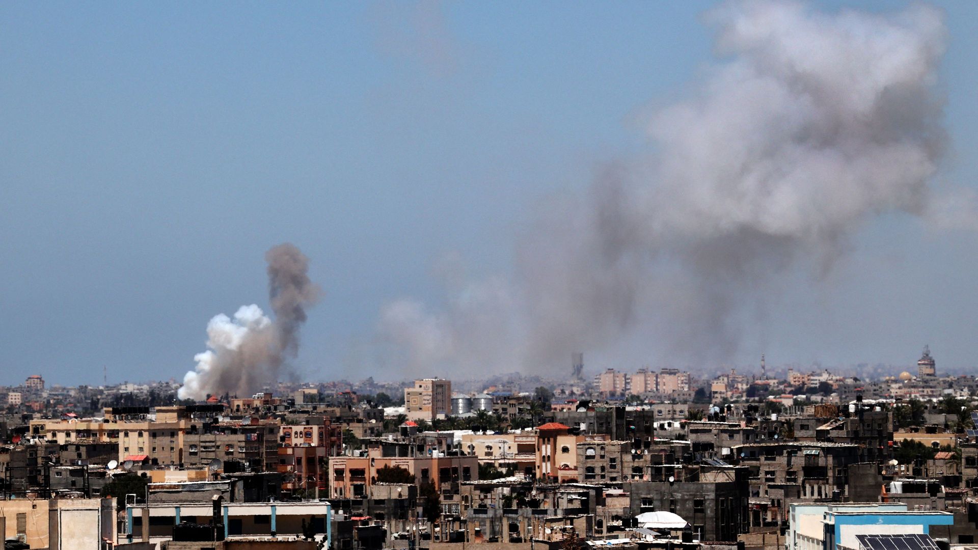 Smoke billows following an Israeli air strike in Rafah town in the southern Gaza Strip, on May 15, 2021. 
