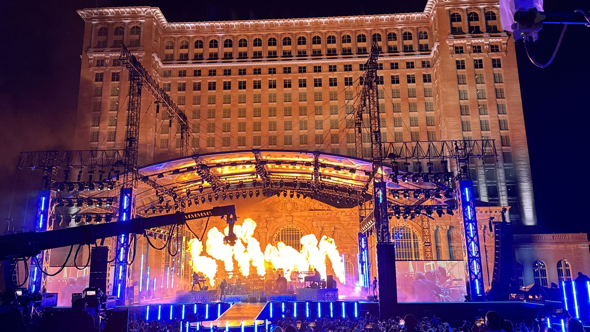 Jack White performs as fire shoots into the air in front of Michigan Central Station Thursday night. Photo: Samuel Robinson/Axios
