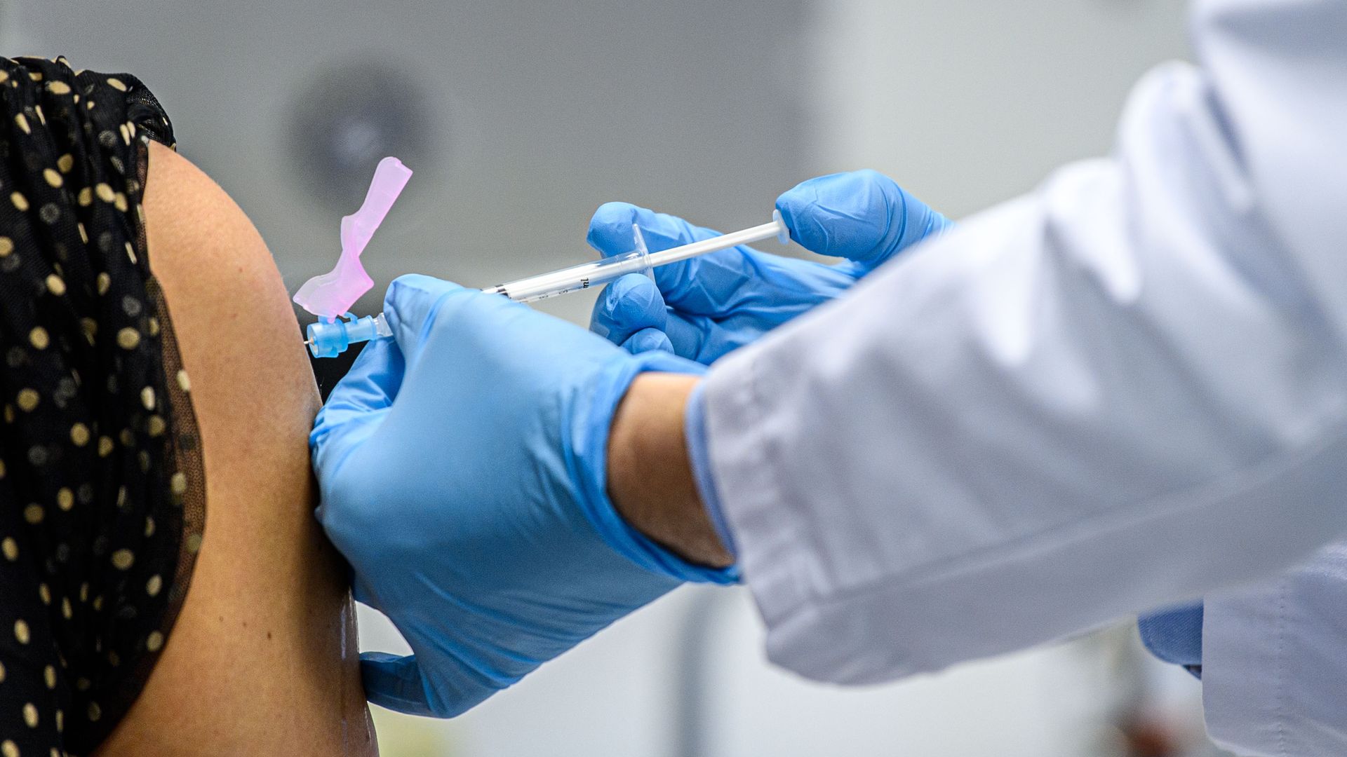 A doctor administering Moderna's coronavirus vaccine at a university hospital in Essen, Germany, on Jan. 18.