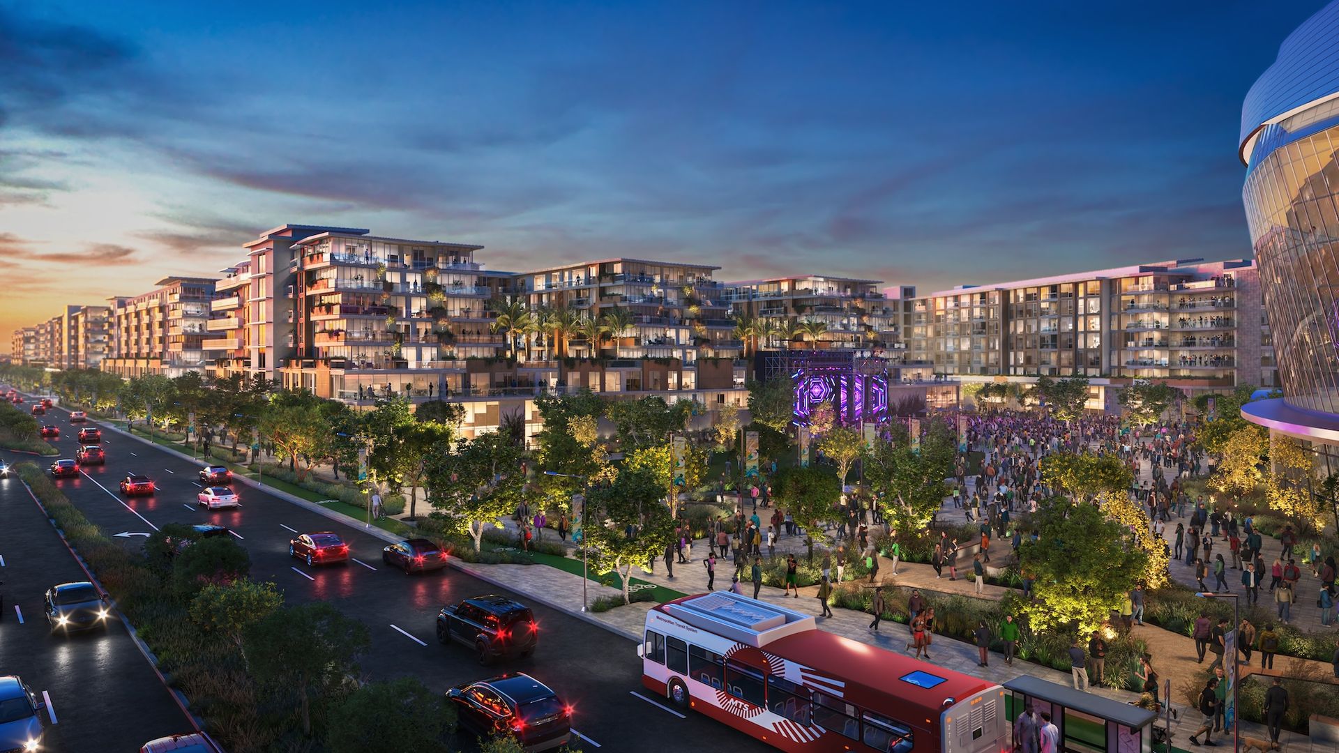 Evening cityscape with modern apartment buildings, a lively crowd near an arena with purple lights, trees, cars on the road, and a red and white transit bus at a bus stop.