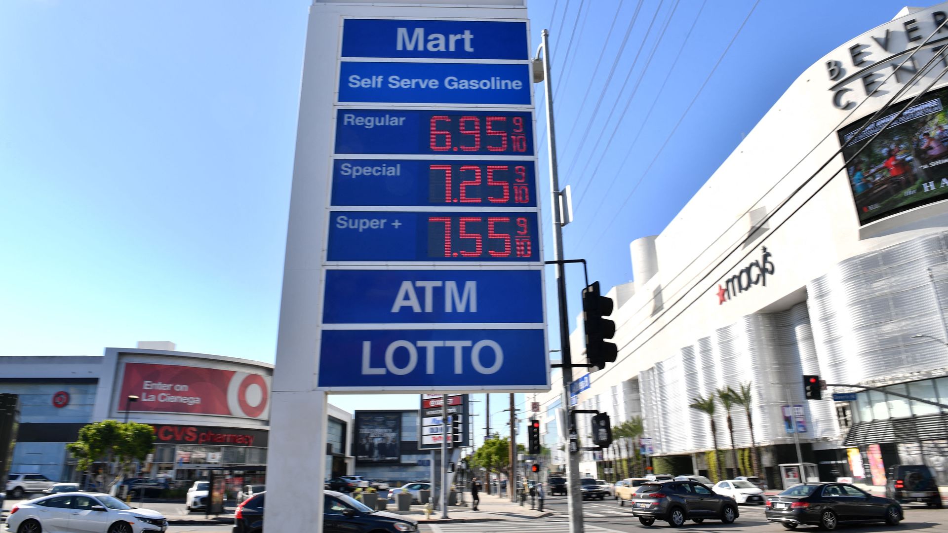 Gas prices over $6.00 and $7.00 a gallon are posted at a petrol station in Los Angeles, California on March 7, 2022.
