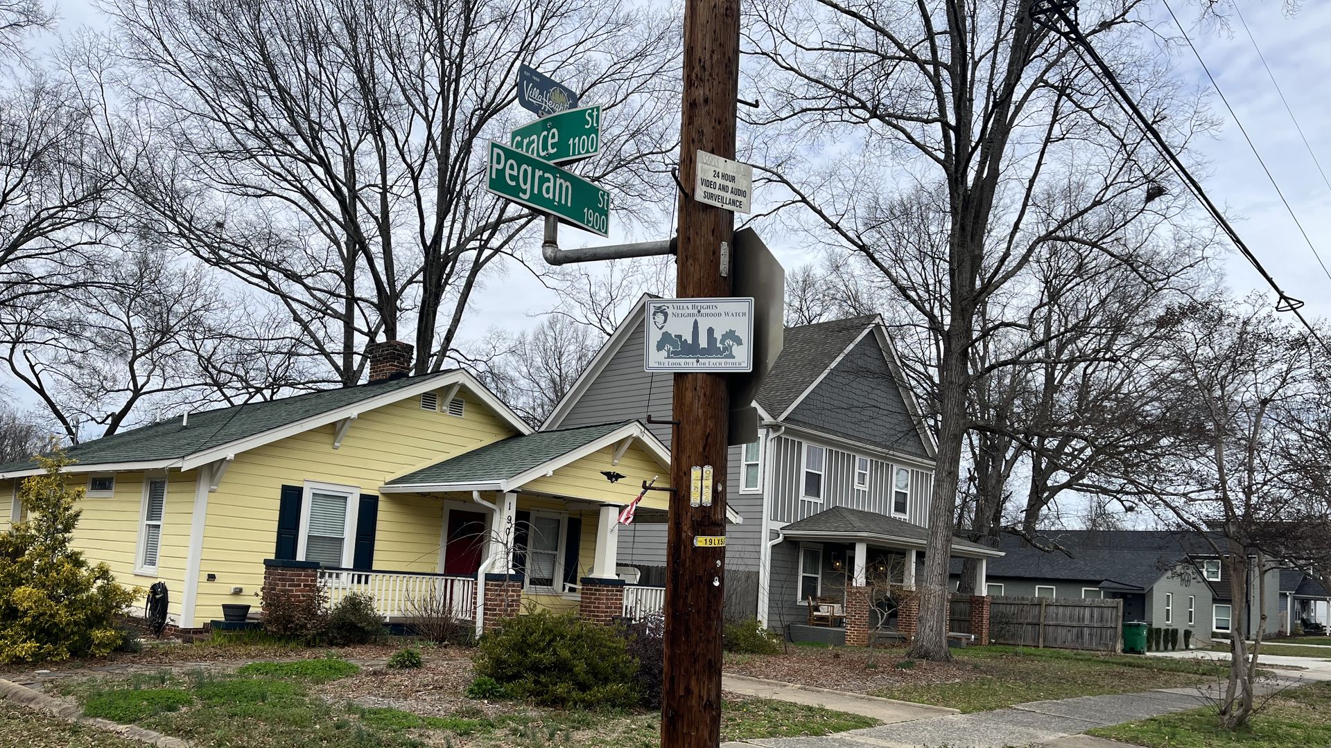 An intersection with two houses 