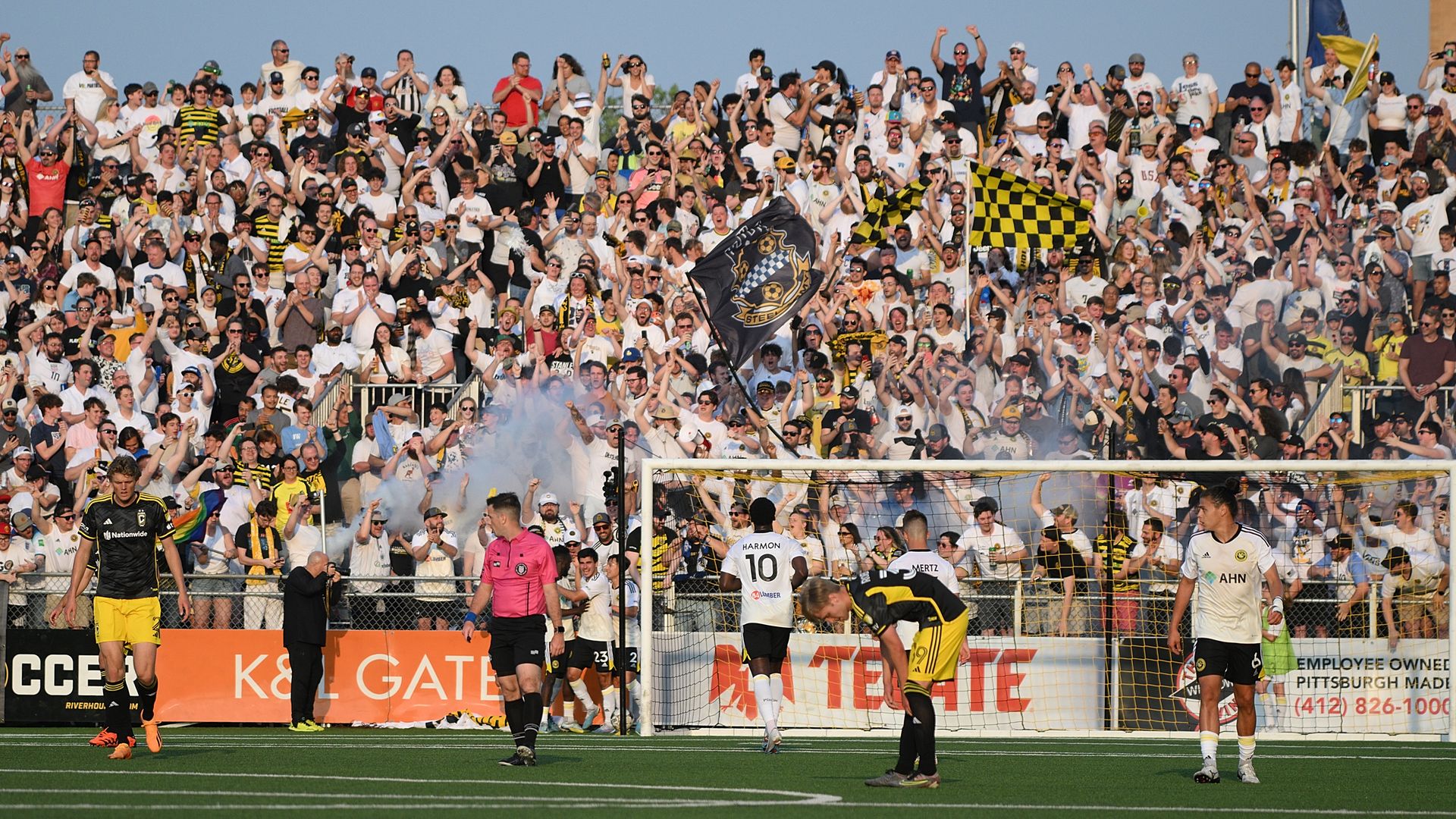 The Pittsburgh Riverhounds SC supporters section celebrate a goal by Albert Dikwa #9 in the first half of a US Open Cup match against the Columbus Crew at Highmark Stadium on May 24, 2023 in Pittsburgh, Pennsylvania. (Photo by Justin Berl/USSF/Getty Images)