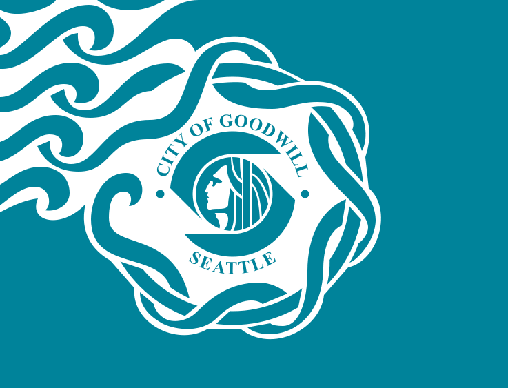 Seattle's flag has a teal background, white waves and lettering that says "City of Goodwill." 