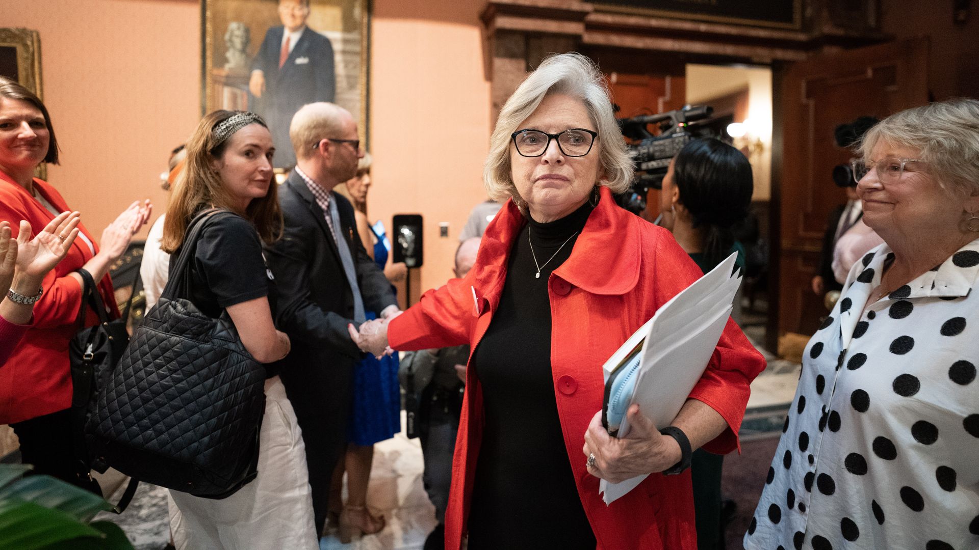 Republican state Sen. Katrina Shealy receives applause from supporters after the Senate passed a ban on abortion after six weeks of pregnancy at the South Carolina Statehouse on May 23, 2023 in Columbia, South Carolina. 