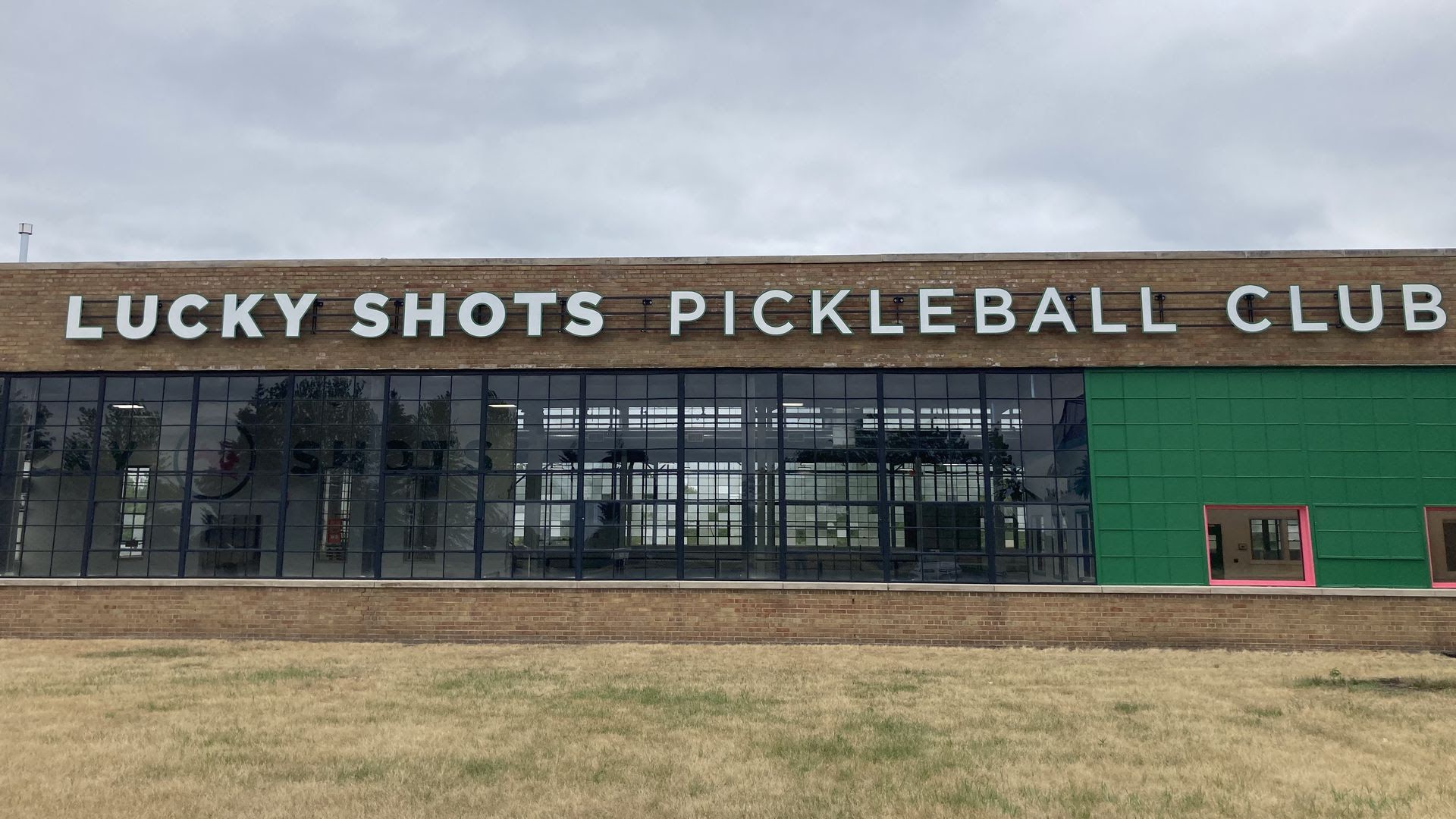 The exterior of Lucky Shots Pickleball Club, a new pickleball facility in Minneapolis.