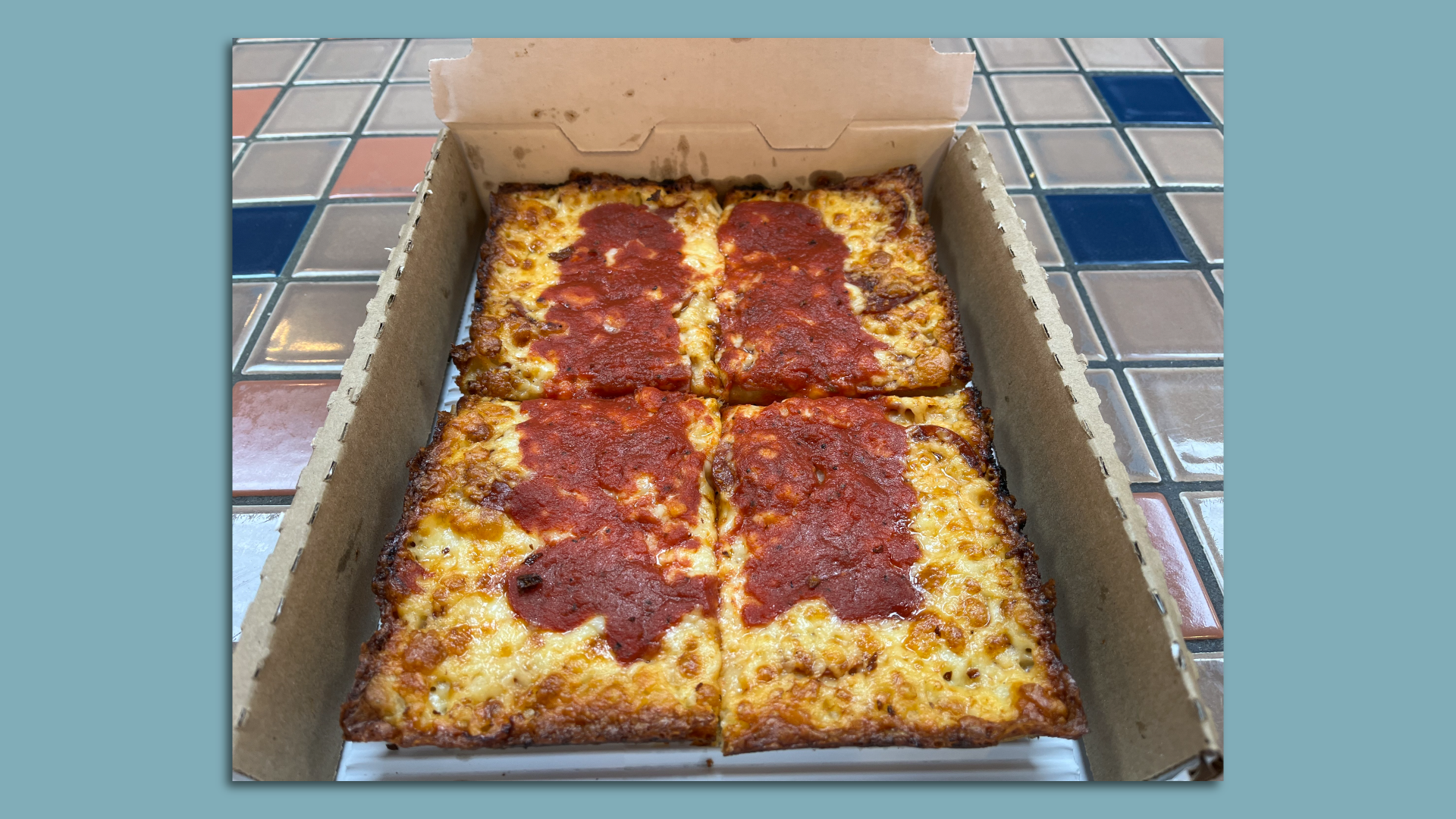 Buddy’s 4-Square pizza with pepperoni.