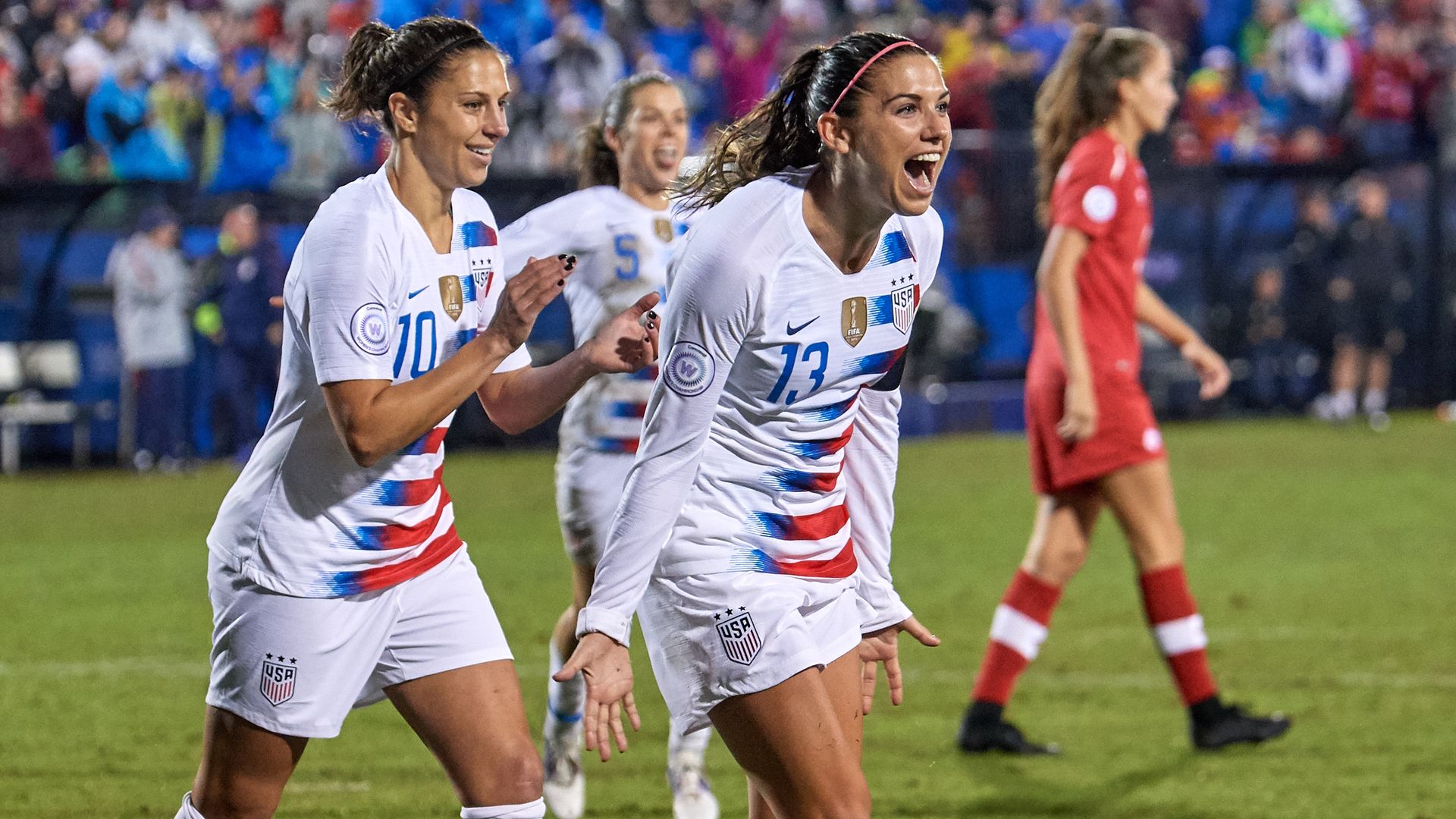 Carli Lloyd and Alex Morgan